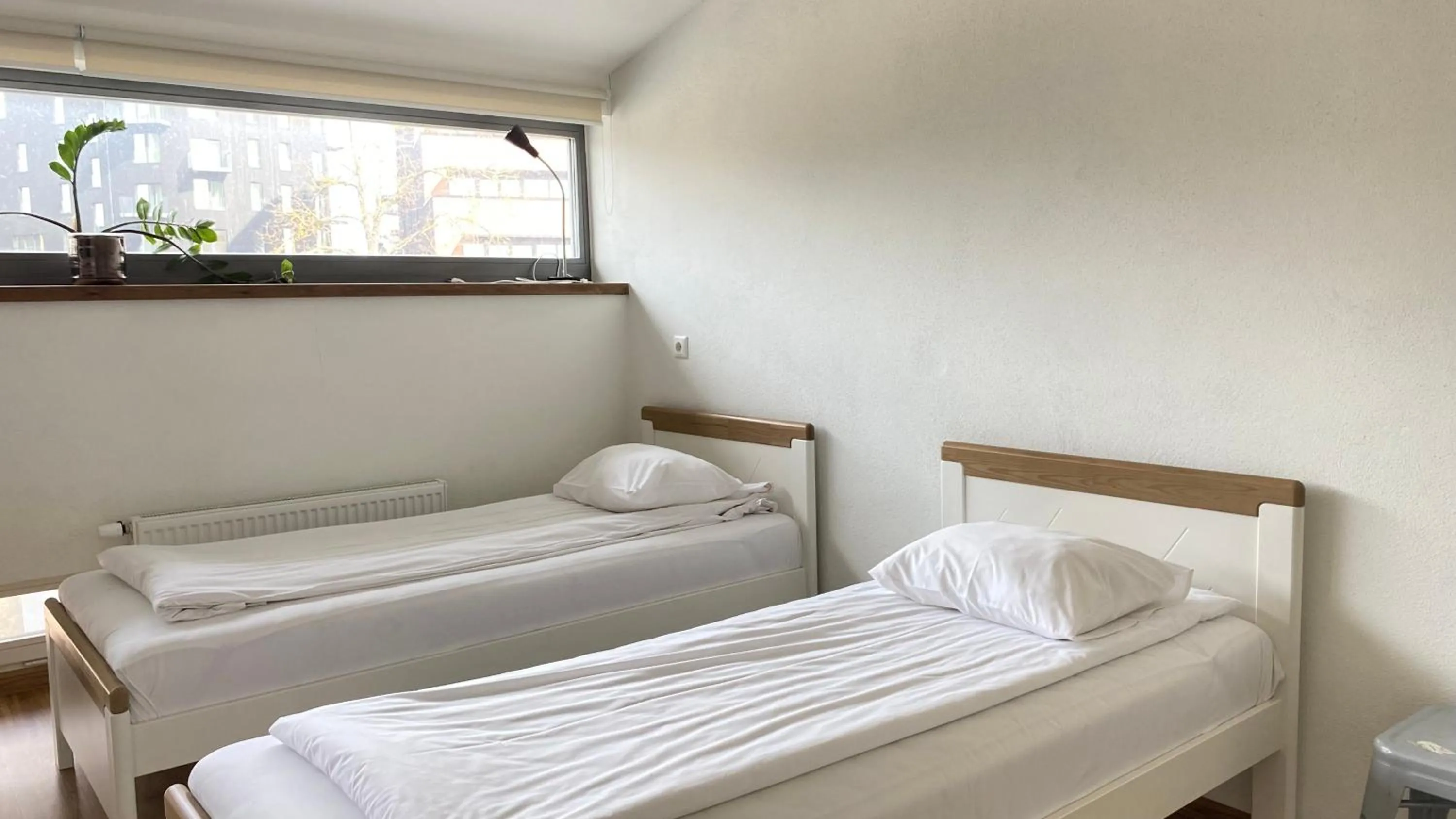 Bed in Filosoofi 1 Studio Apartments