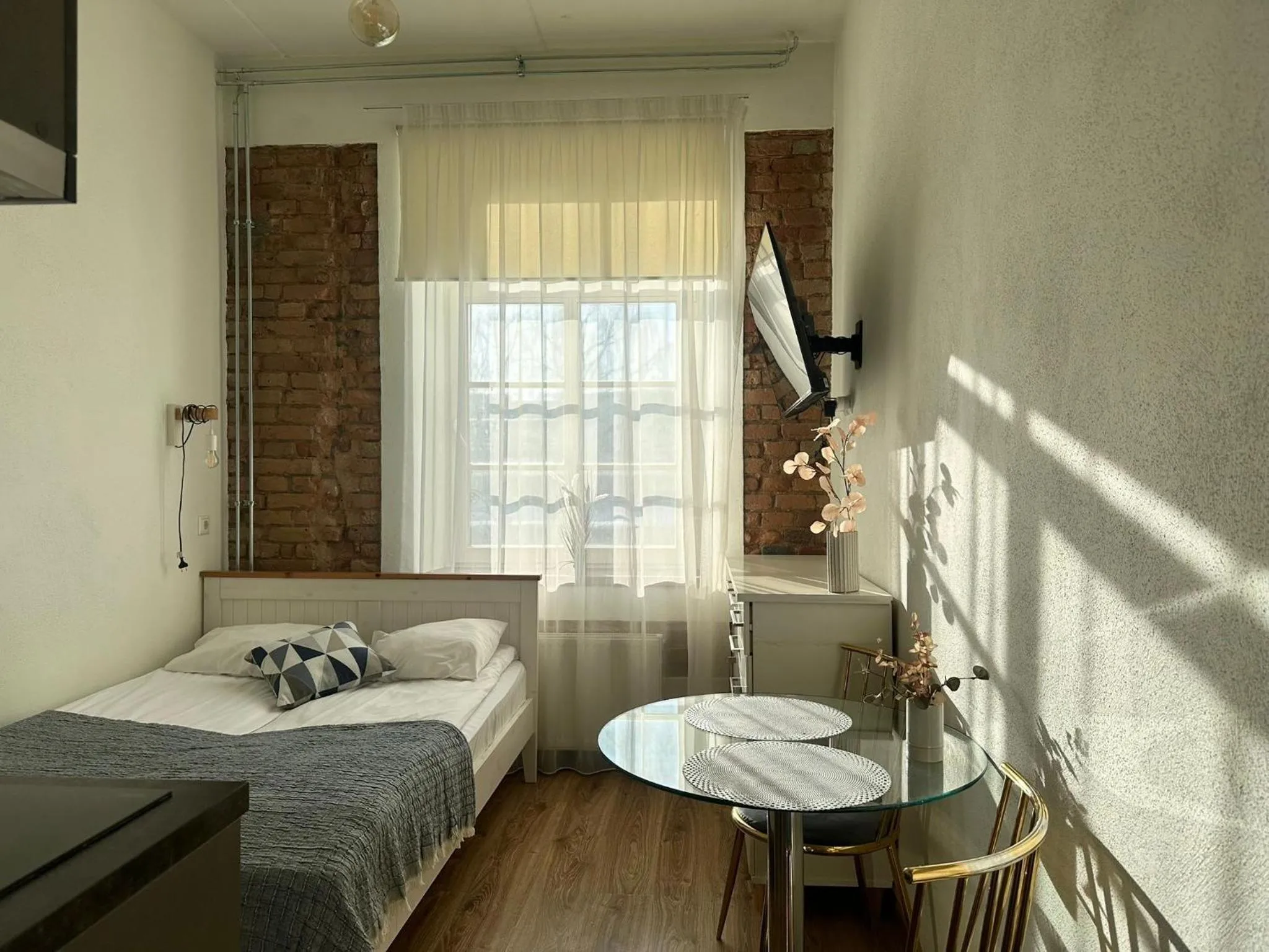 Bed in Filosoofi 1 Studio Apartments