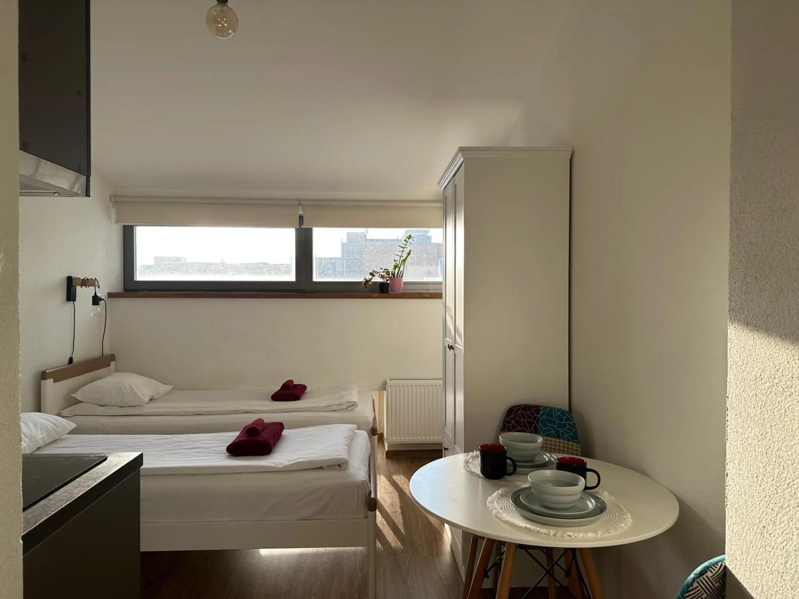 Bed in Filosoofi 1 Studio Apartments