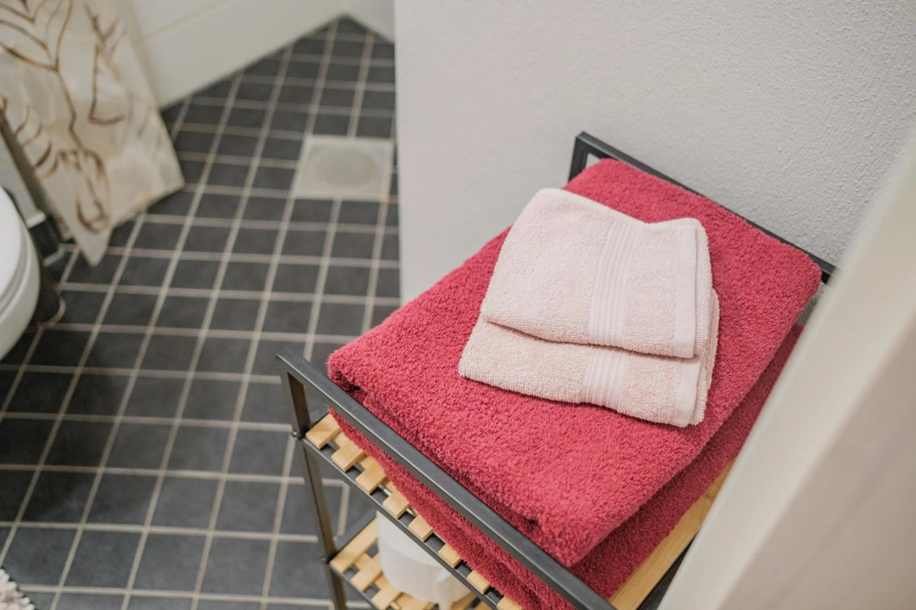 towels, Bed in Filosoofi 1 Studio Apartments