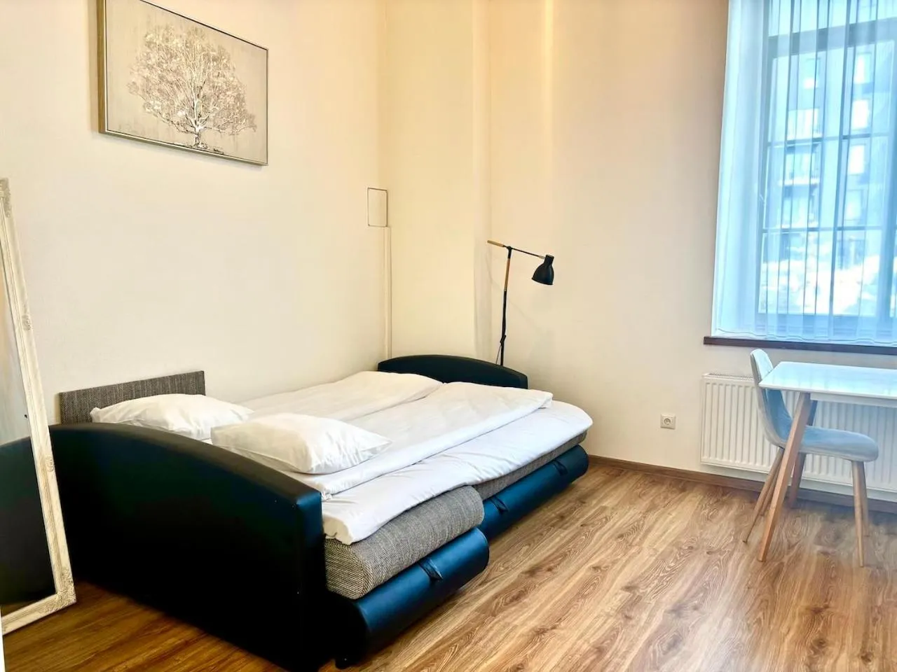 Bed in Filosoofi 1 Studio Apartments