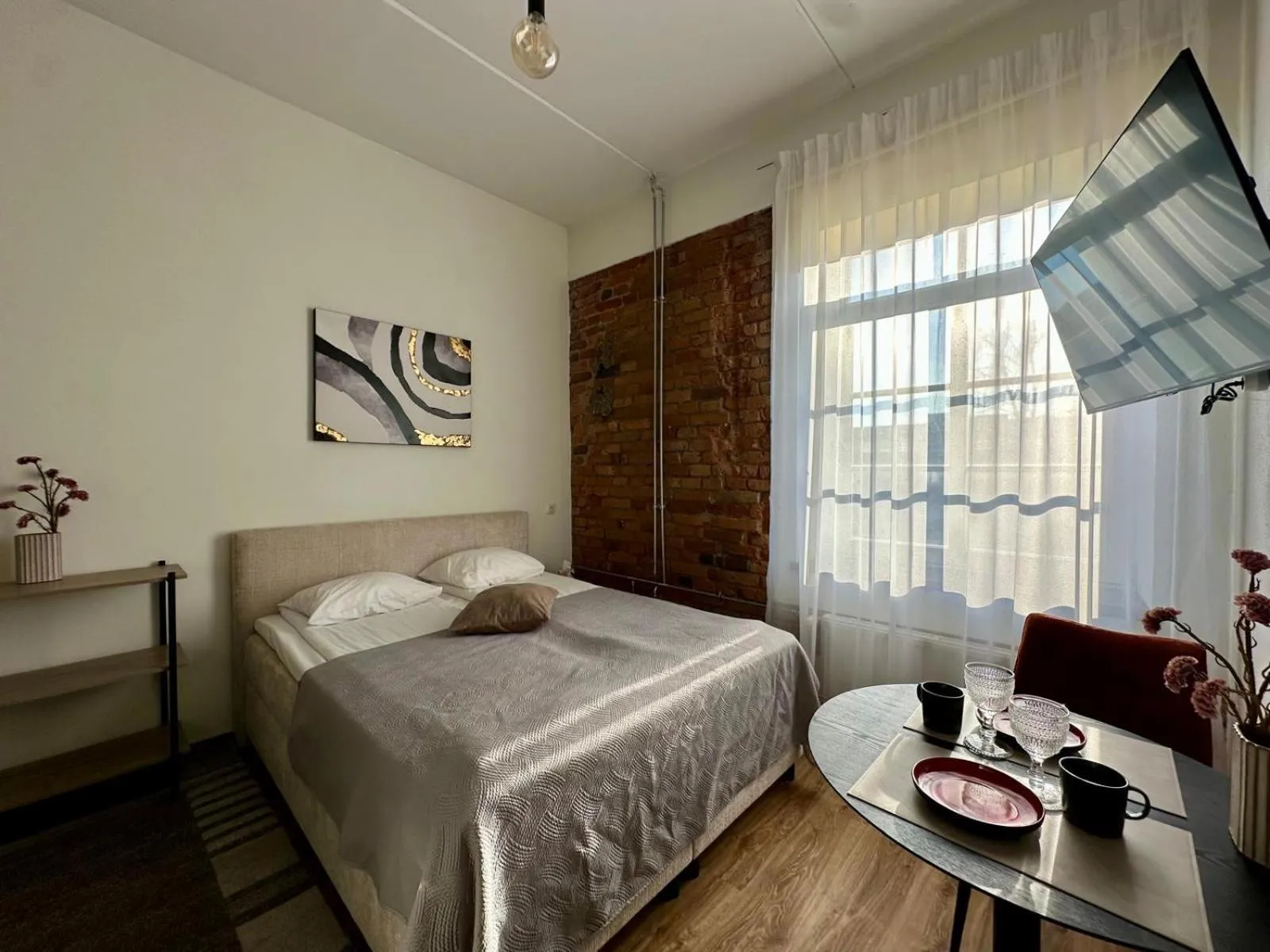 Bed in Filosoofi 1 Studio Apartments