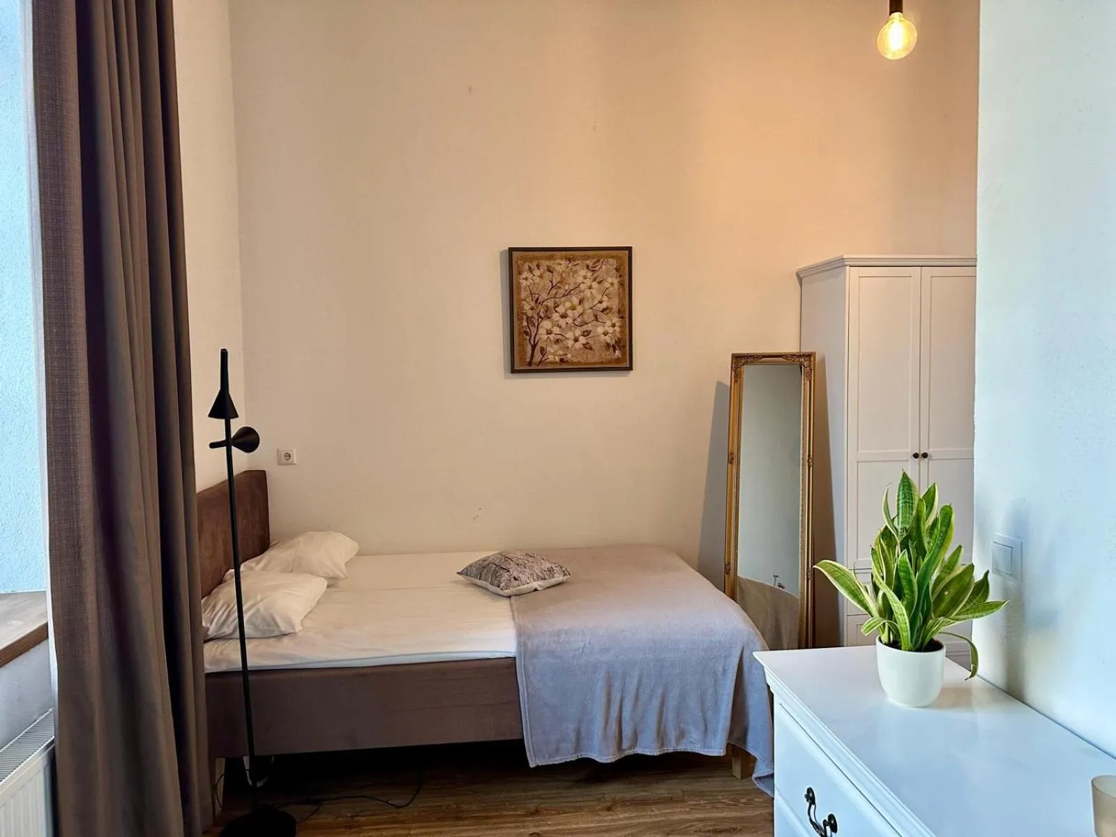 Bed in Filosoofi 1 Studio Apartments
