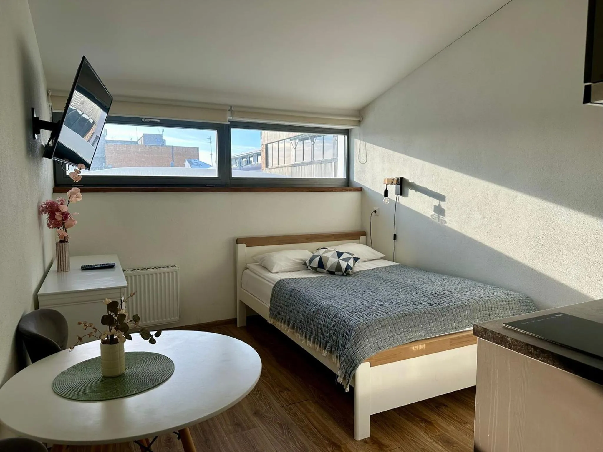 Bed in Filosoofi 1 Studio Apartments