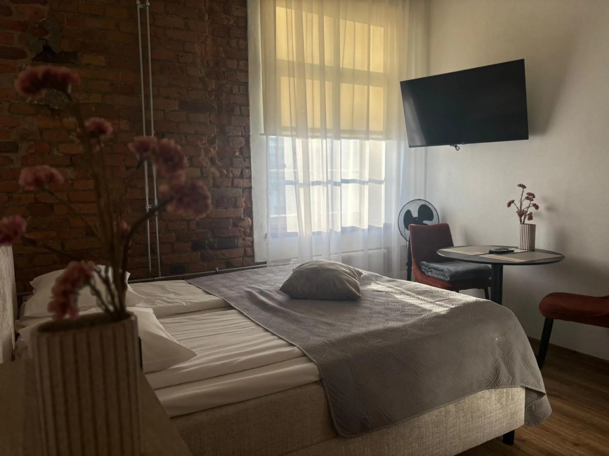 Bed in Filosoofi 1 Studio Apartments