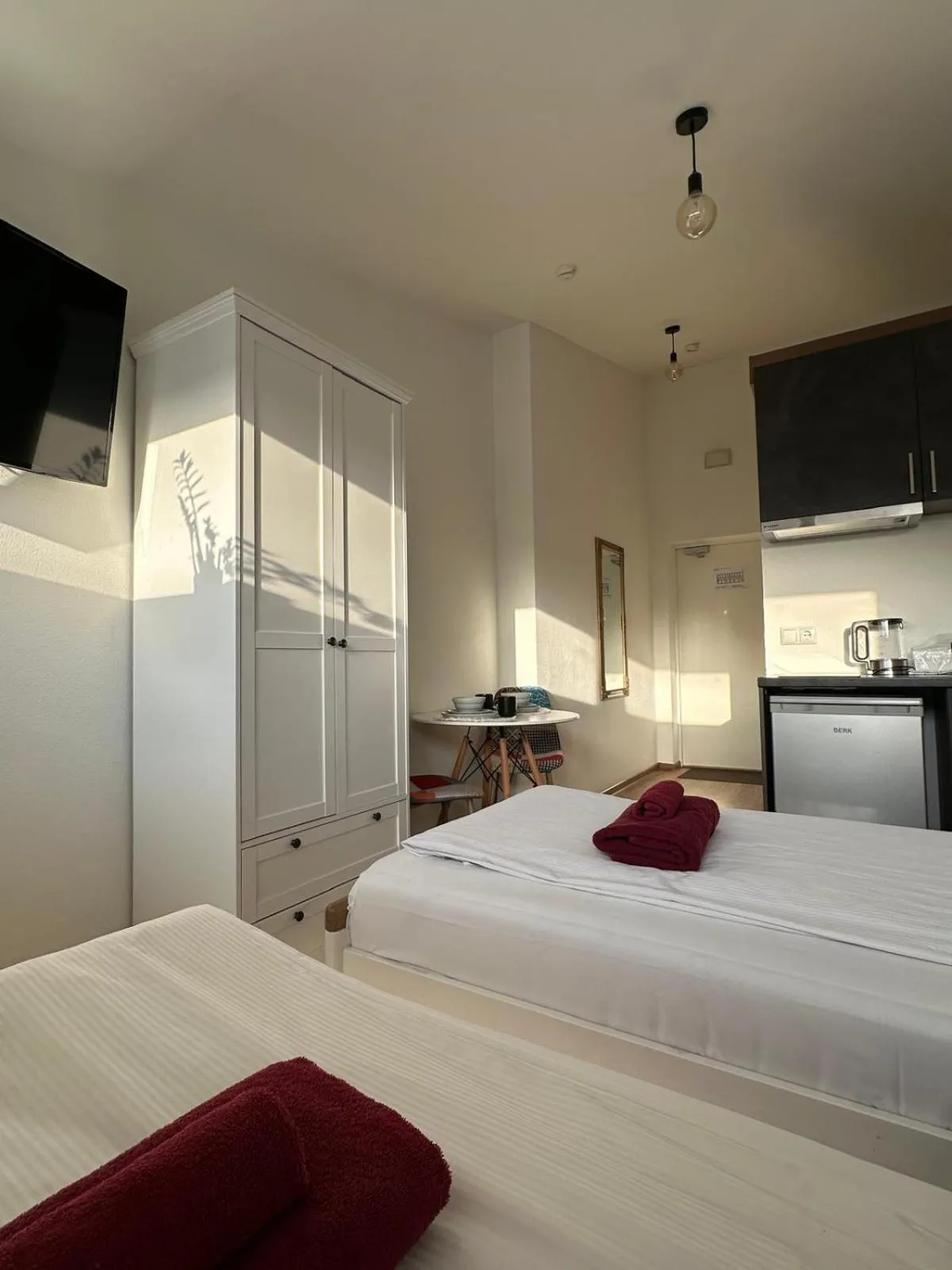 Bed in Filosoofi 1 Studio Apartments