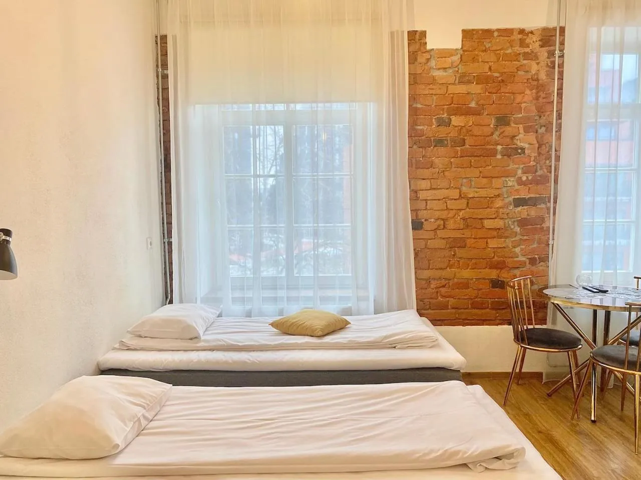 Bed in Filosoofi 1 Studio Apartments