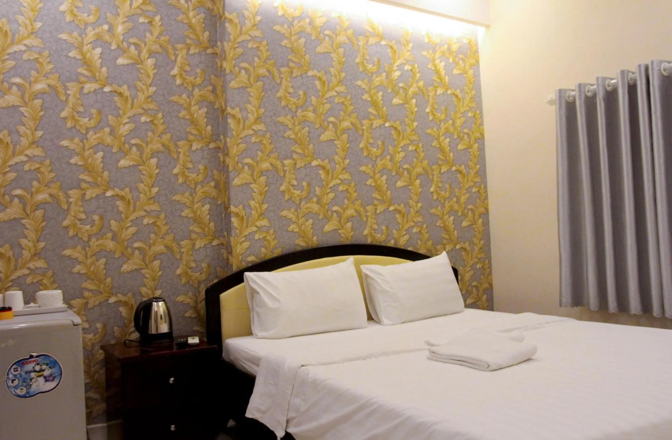 Bed in Violet Star Hotel and Spa