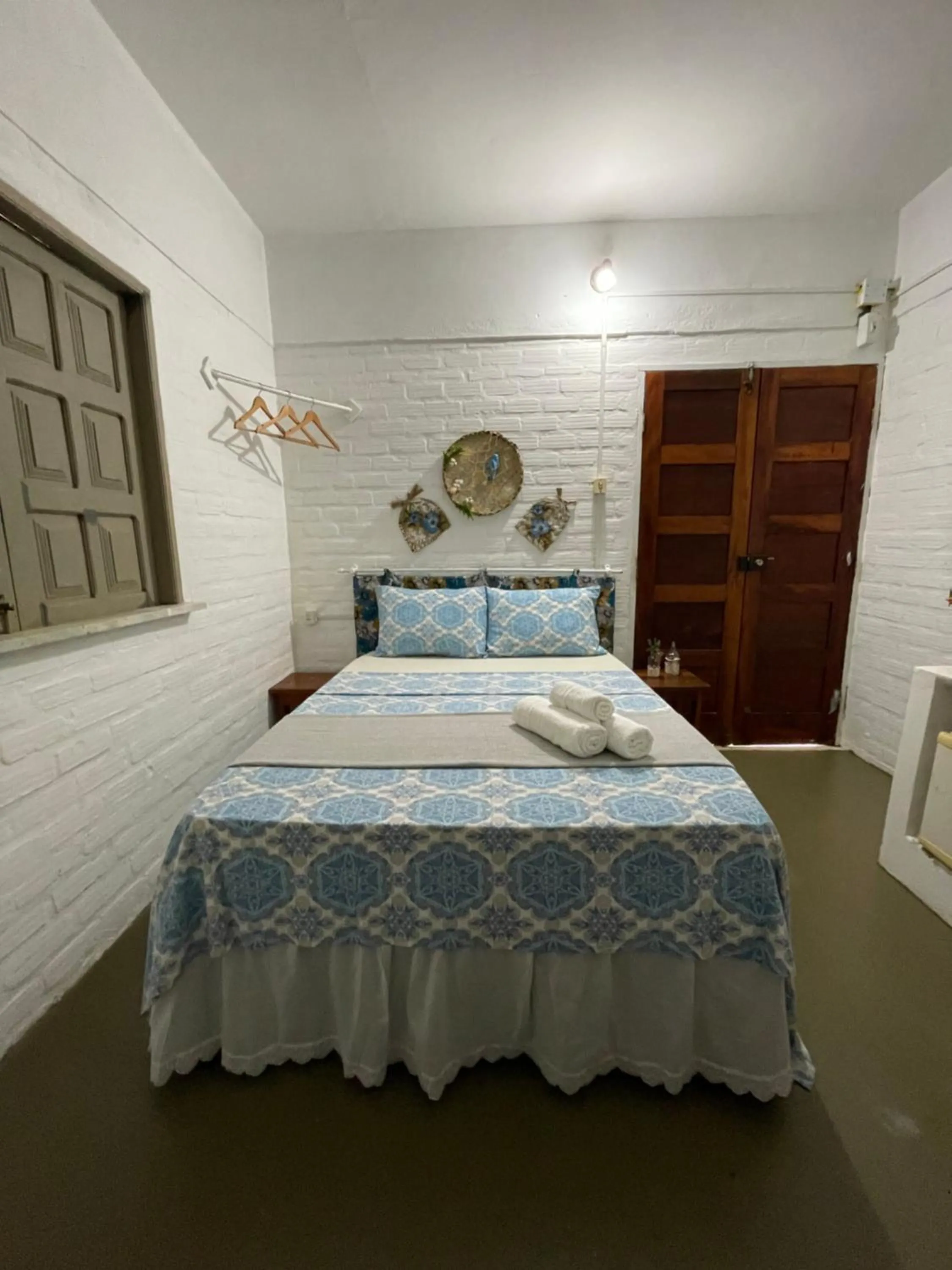Photo of the whole room, Bed in Pousada Nascer do Sol