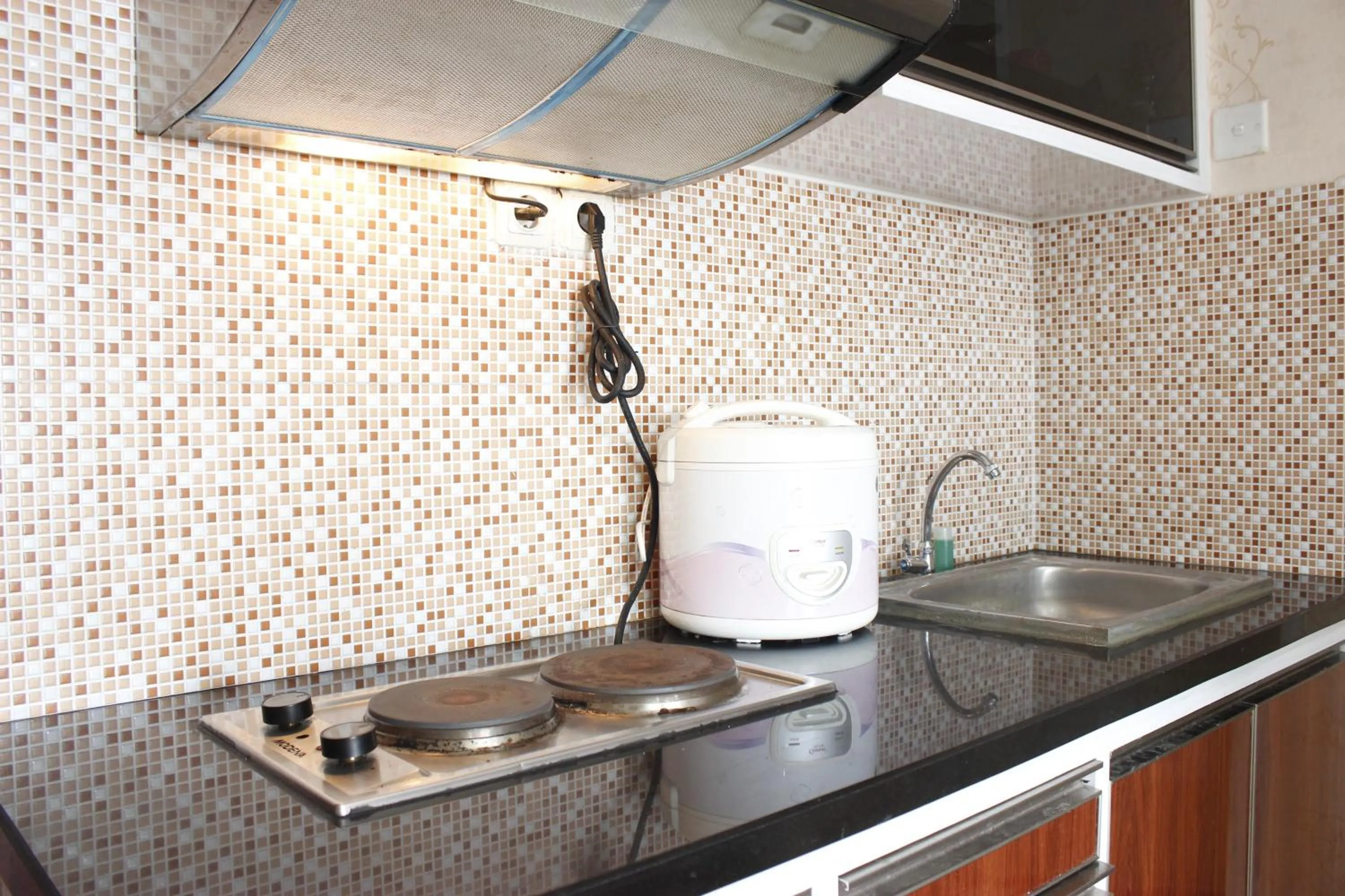 Cozy 2BR Tamansari Panoramic Apartment By Travelio