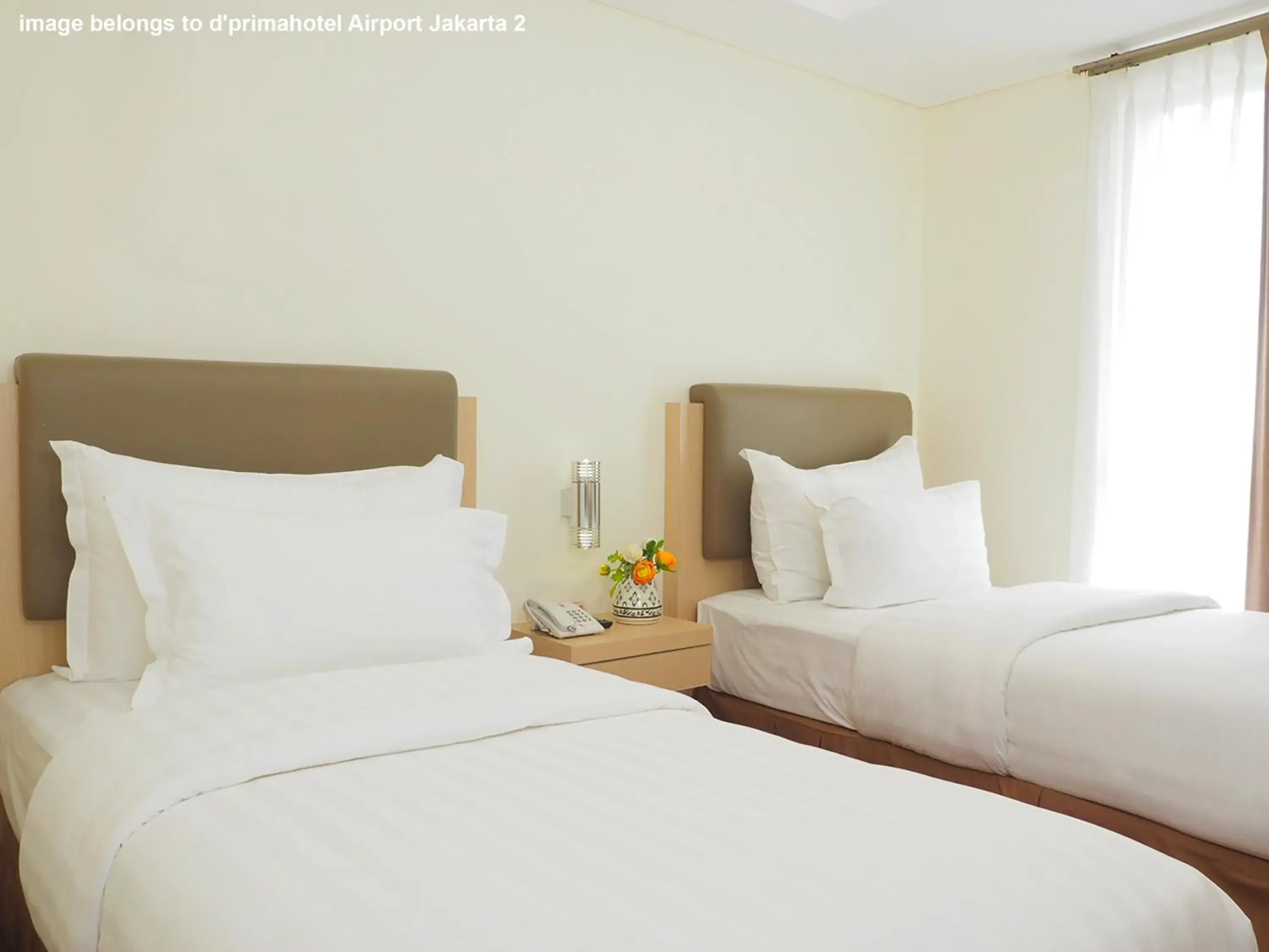 Coffee/tea facilities, Bed in d'primahotel Panakkukang Makassar (Formerly Fave Panakkukang) Coffee/tea facilities, Bed in d'primahotel Panakkukang Makassar (Formerly Fave Panakkukang)