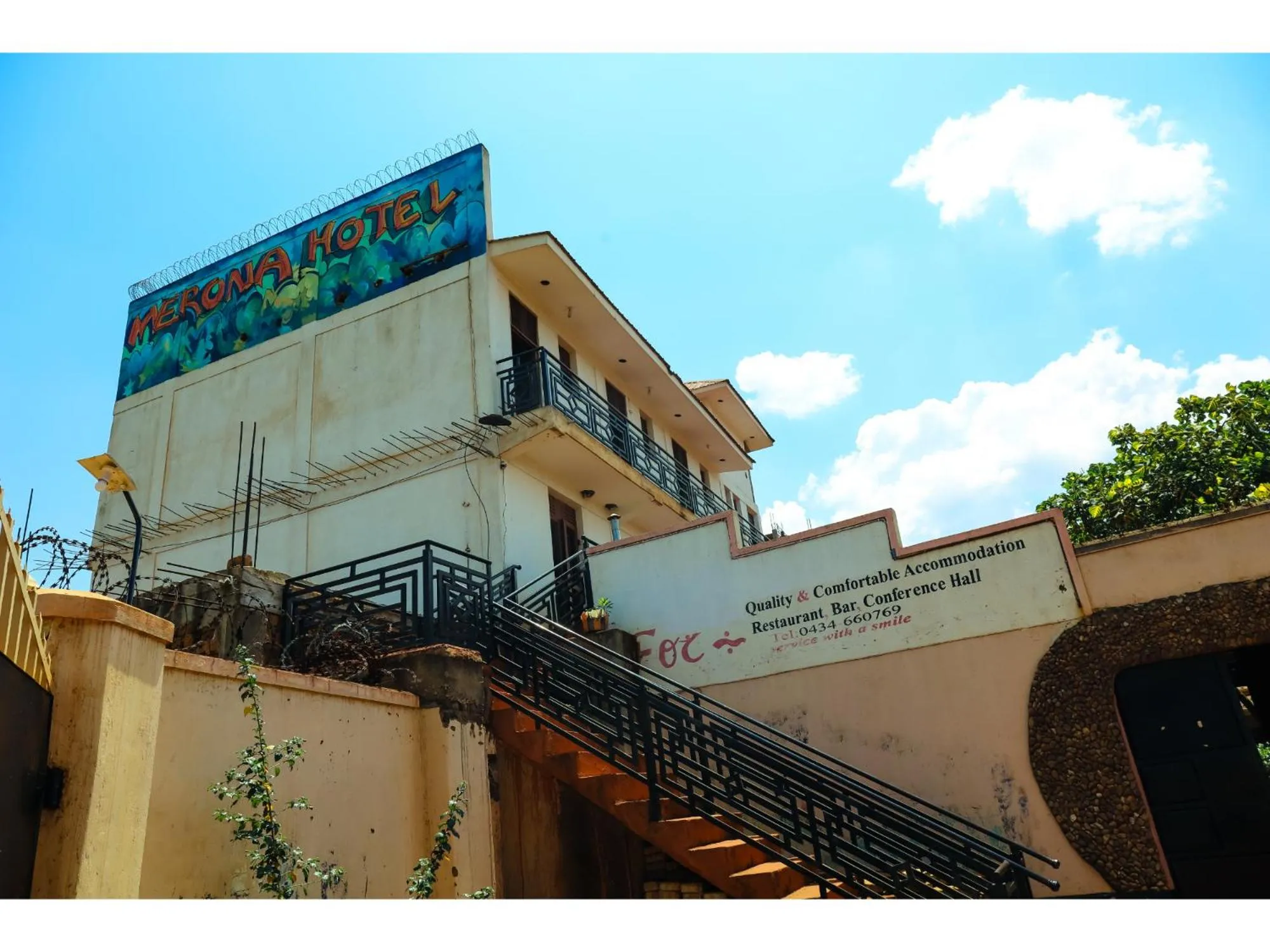 Property logo or sign in Merona Hotel