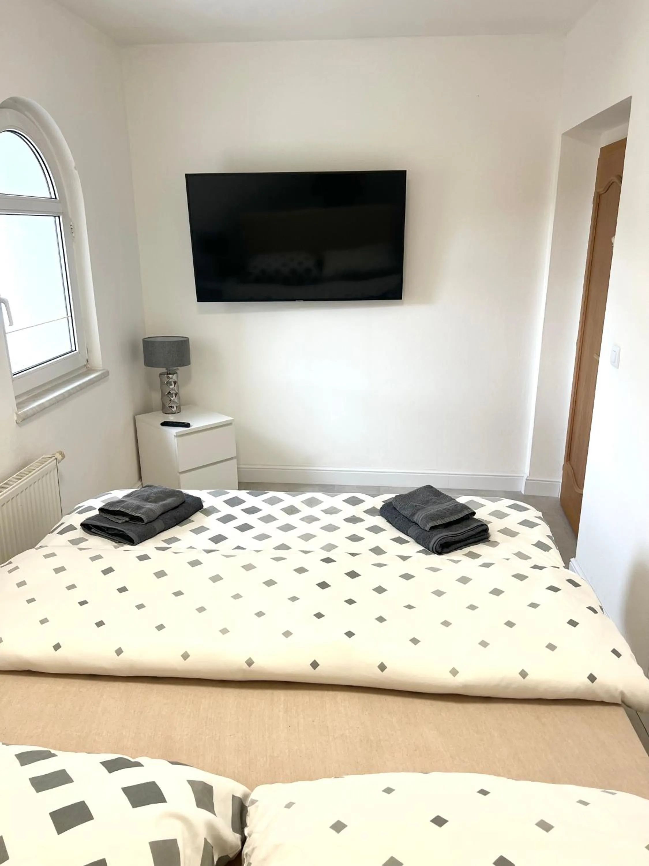 Bed in GrandLux Villa & Spa