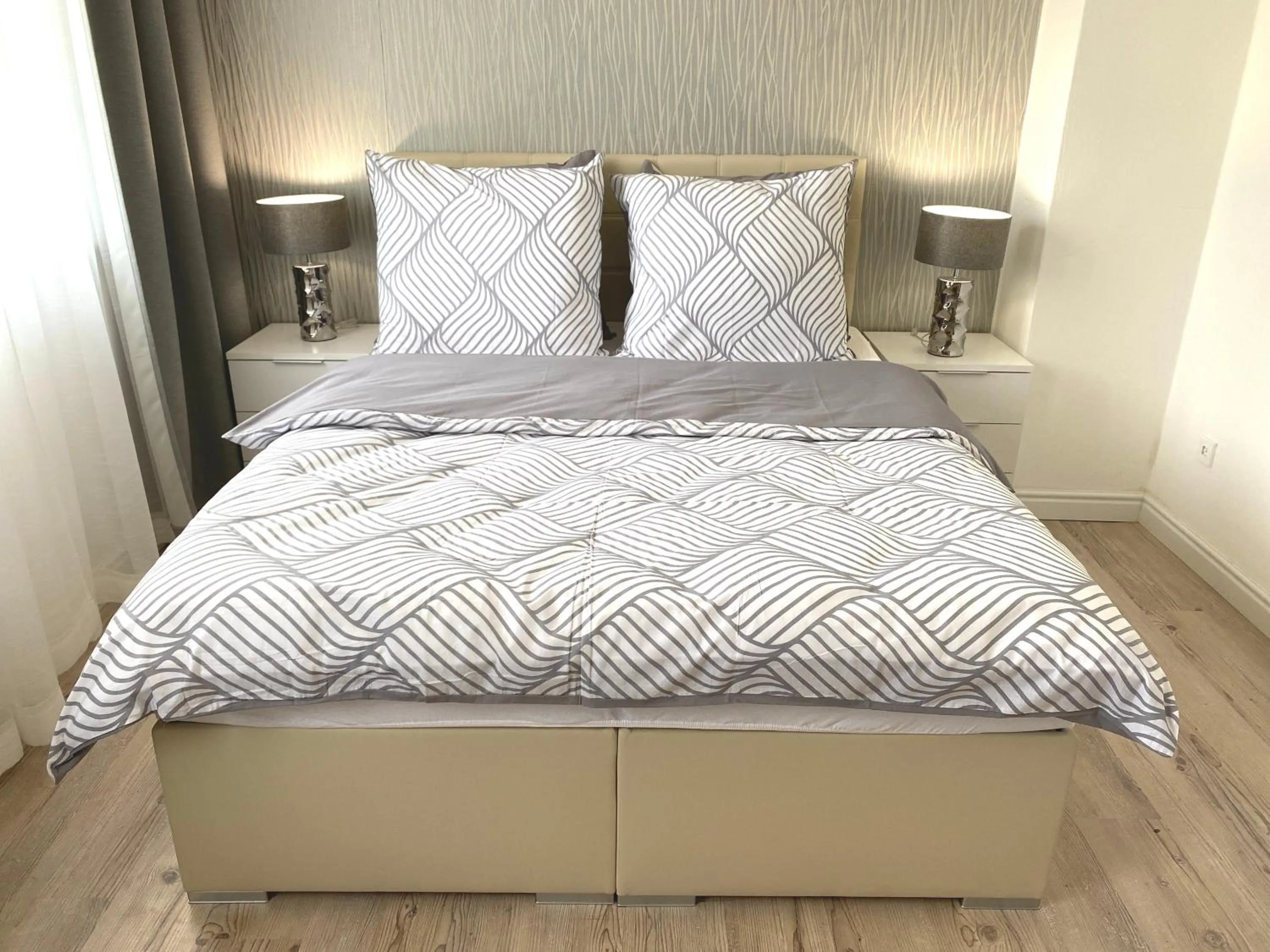 Bed in GrandLux Villa & Spa