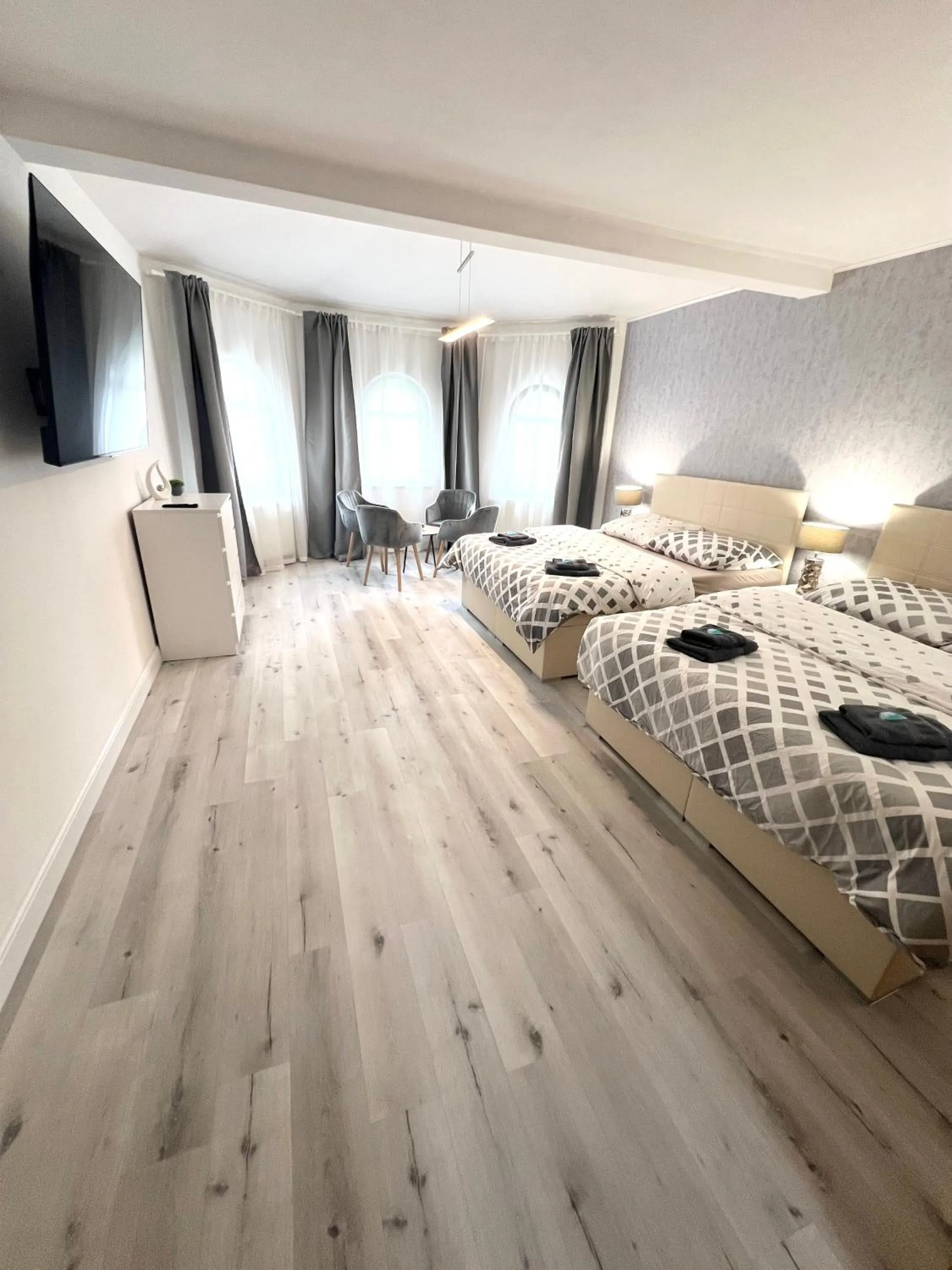 Bed in GrandLux Villa & Spa