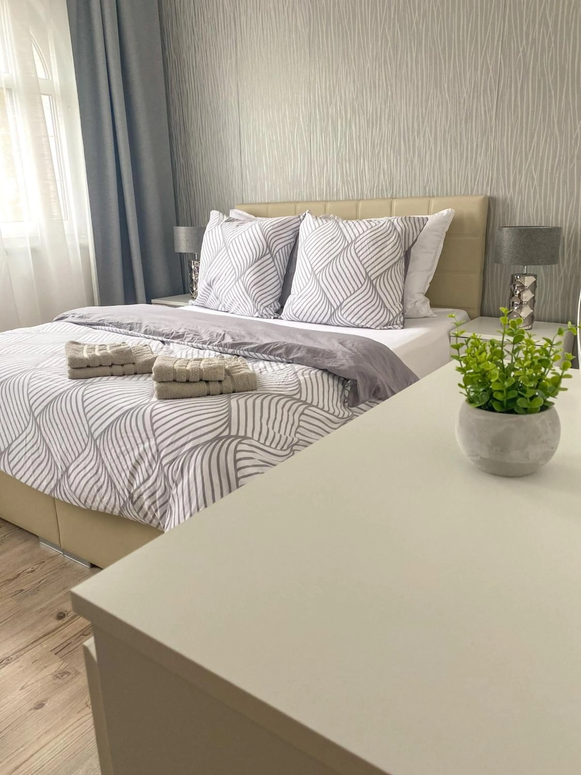 Bed in GrandLux Villa & Spa