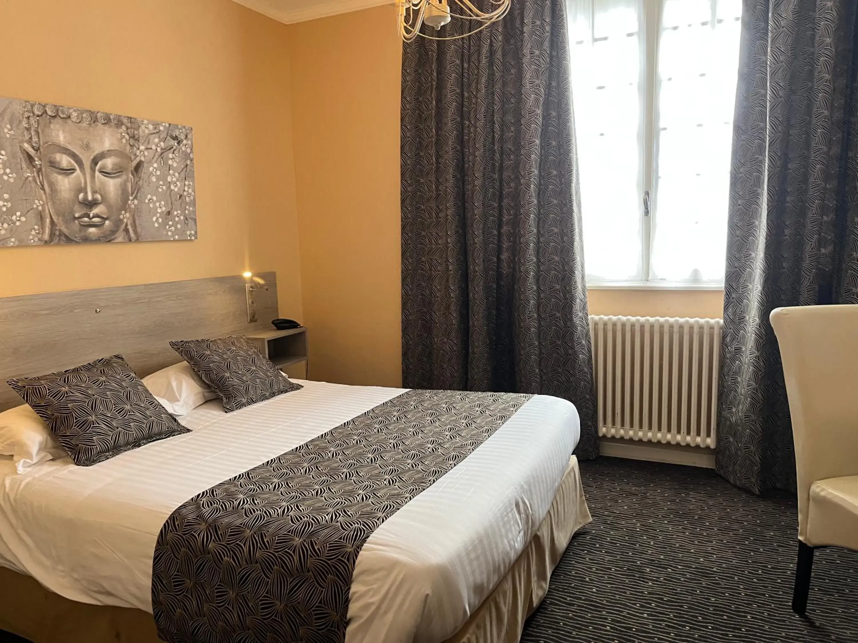 Bed in Logis La Thomasse Bed in Logis La Thomasse