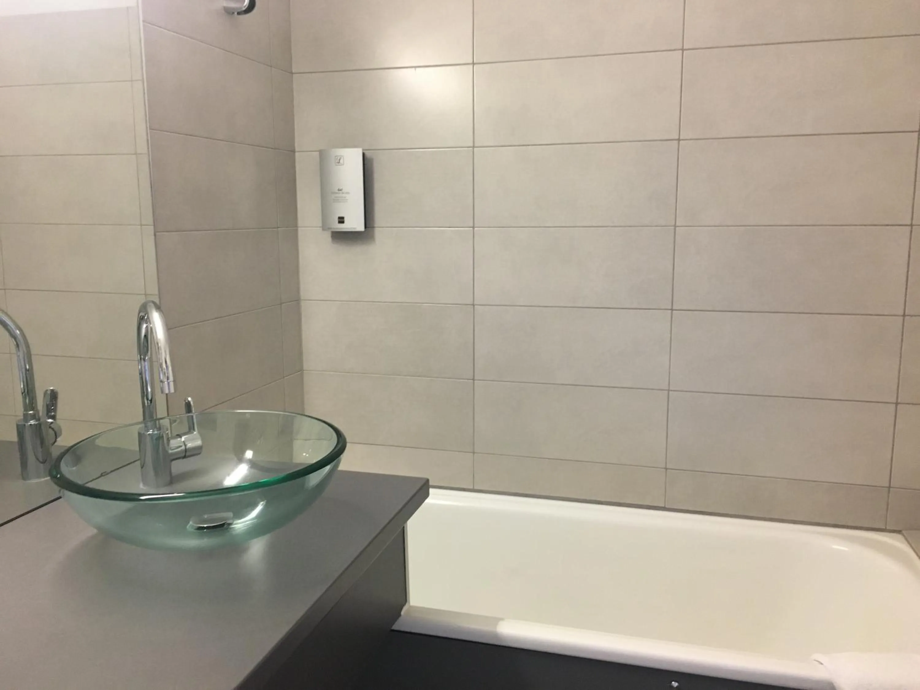 Bathroom in Logis La Thomasse