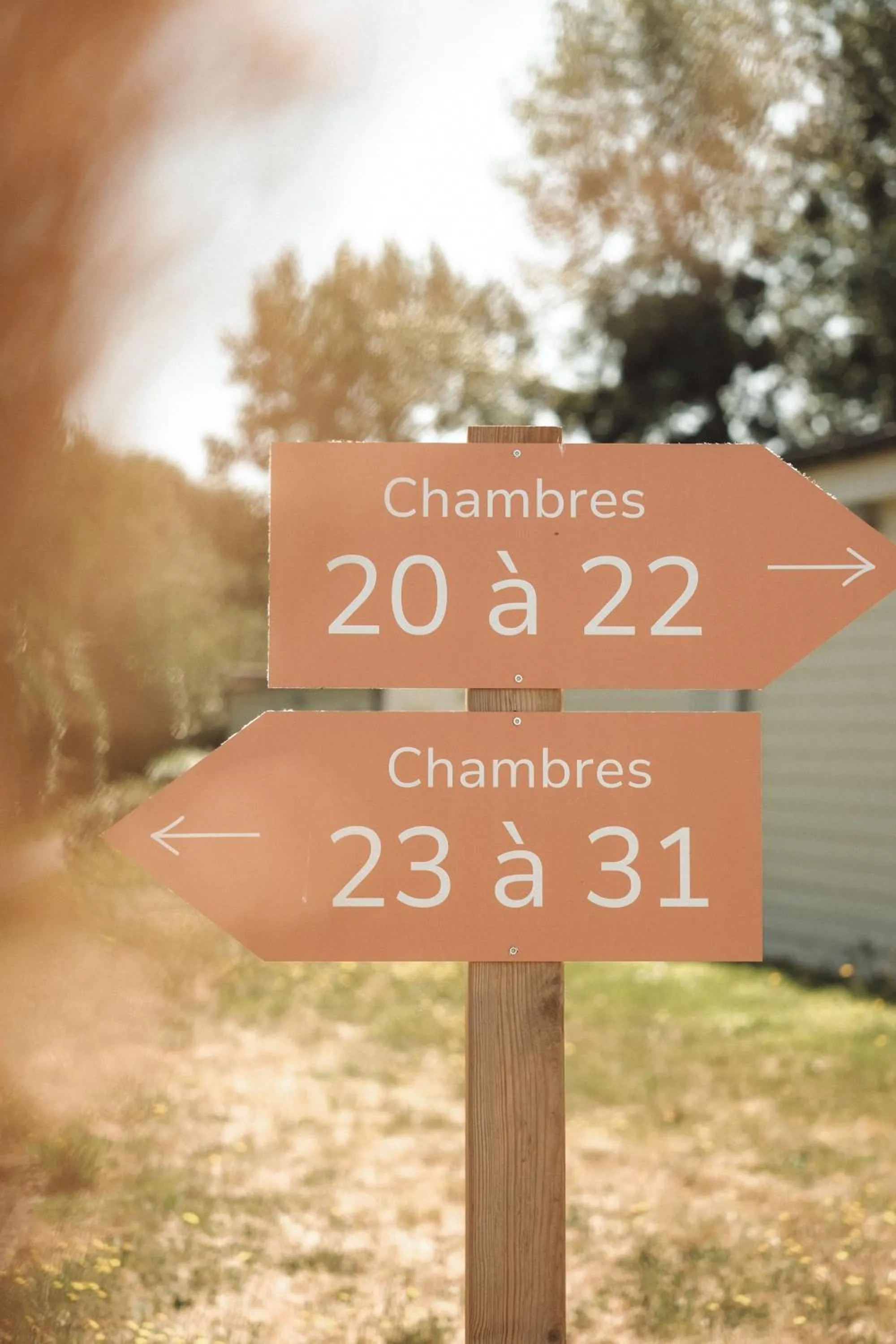 Property logo or sign in Hôtel Les Voisins Beaucemaine