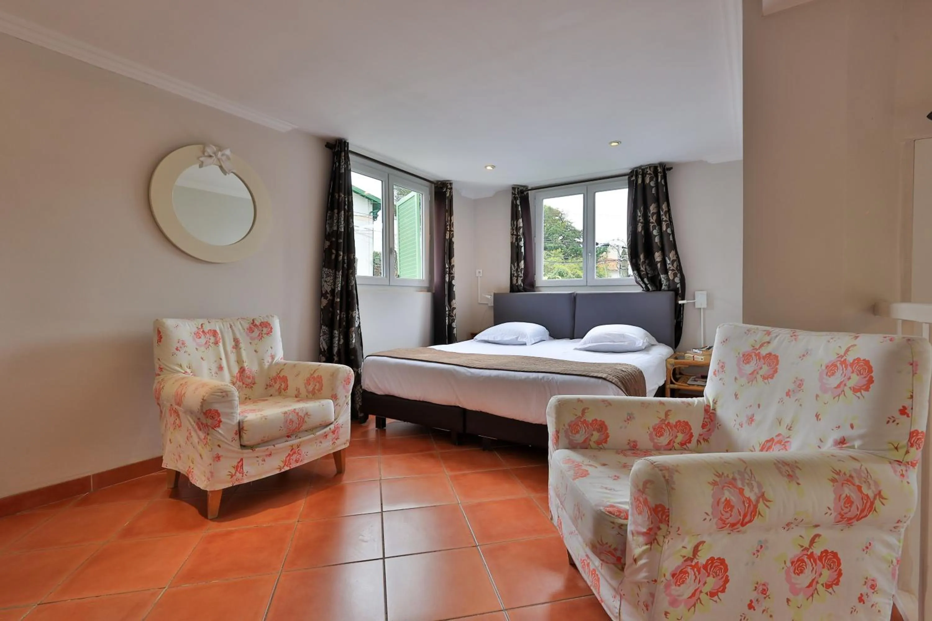 Bed in Emeraude Résidence Hotelière