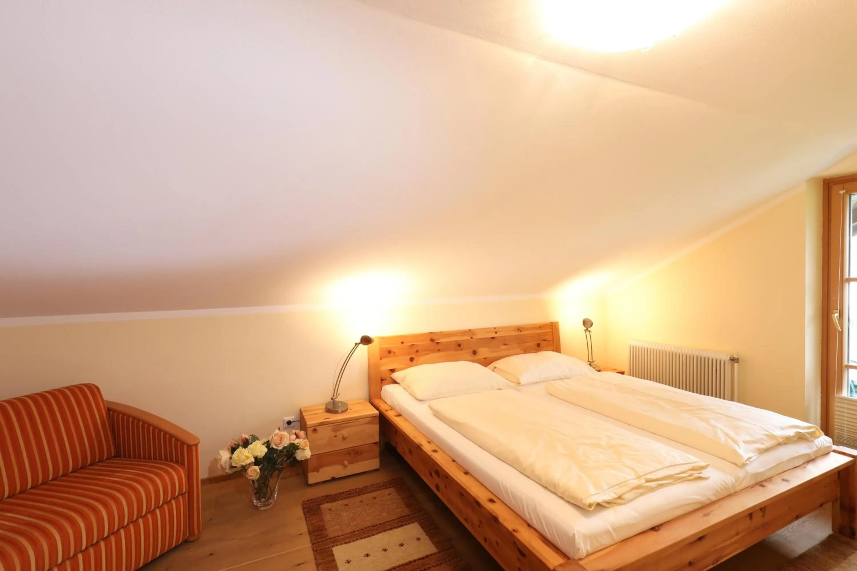 Bed in Hotel Garni Dorferwirt am Irrsee