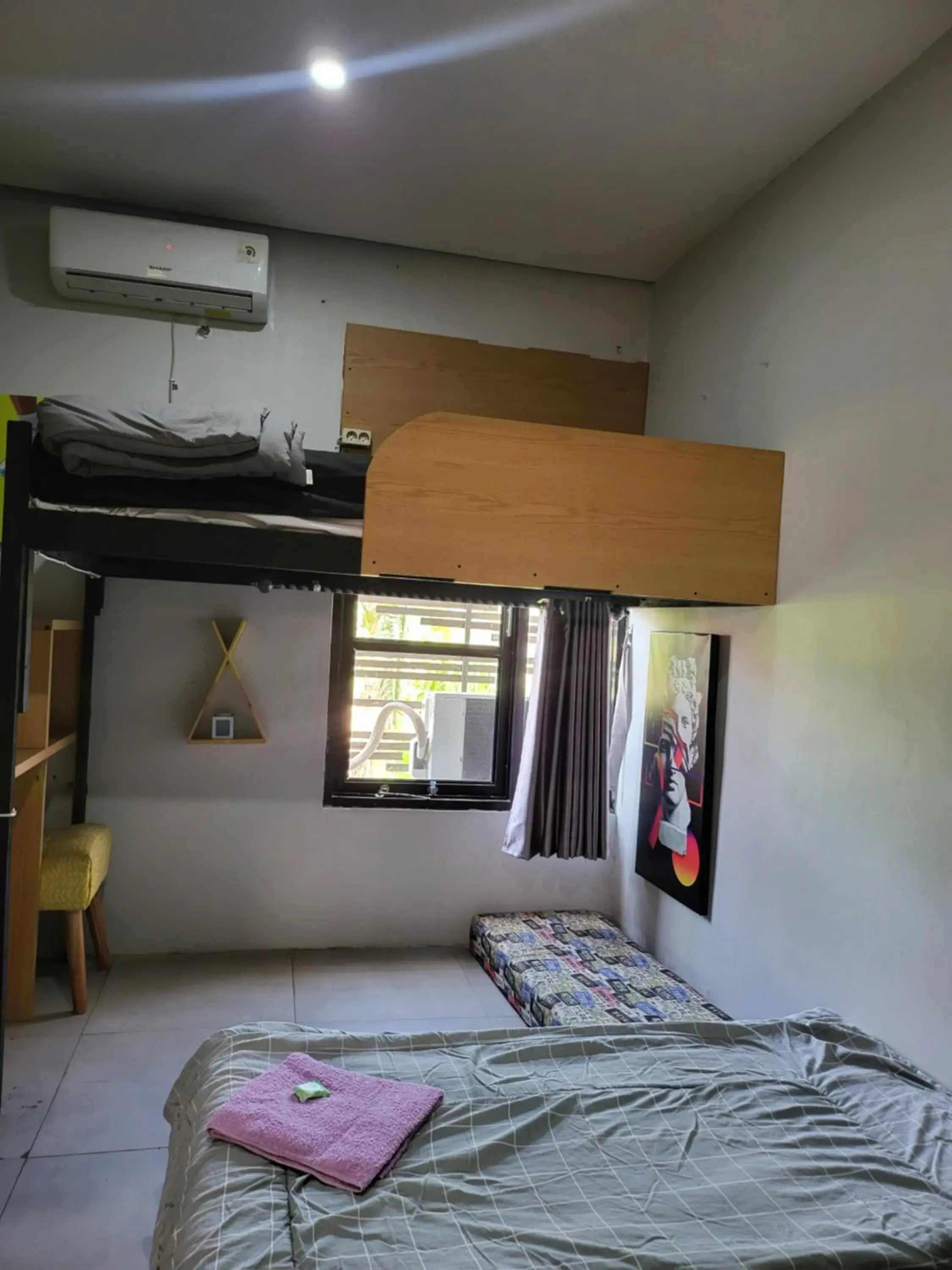 Economy Triple Room with Shared Bathroom in Happy House BnB Bromo backpacker Economy Triple Room with Shared Bathroom in Happy House BnB Bromo backpacker