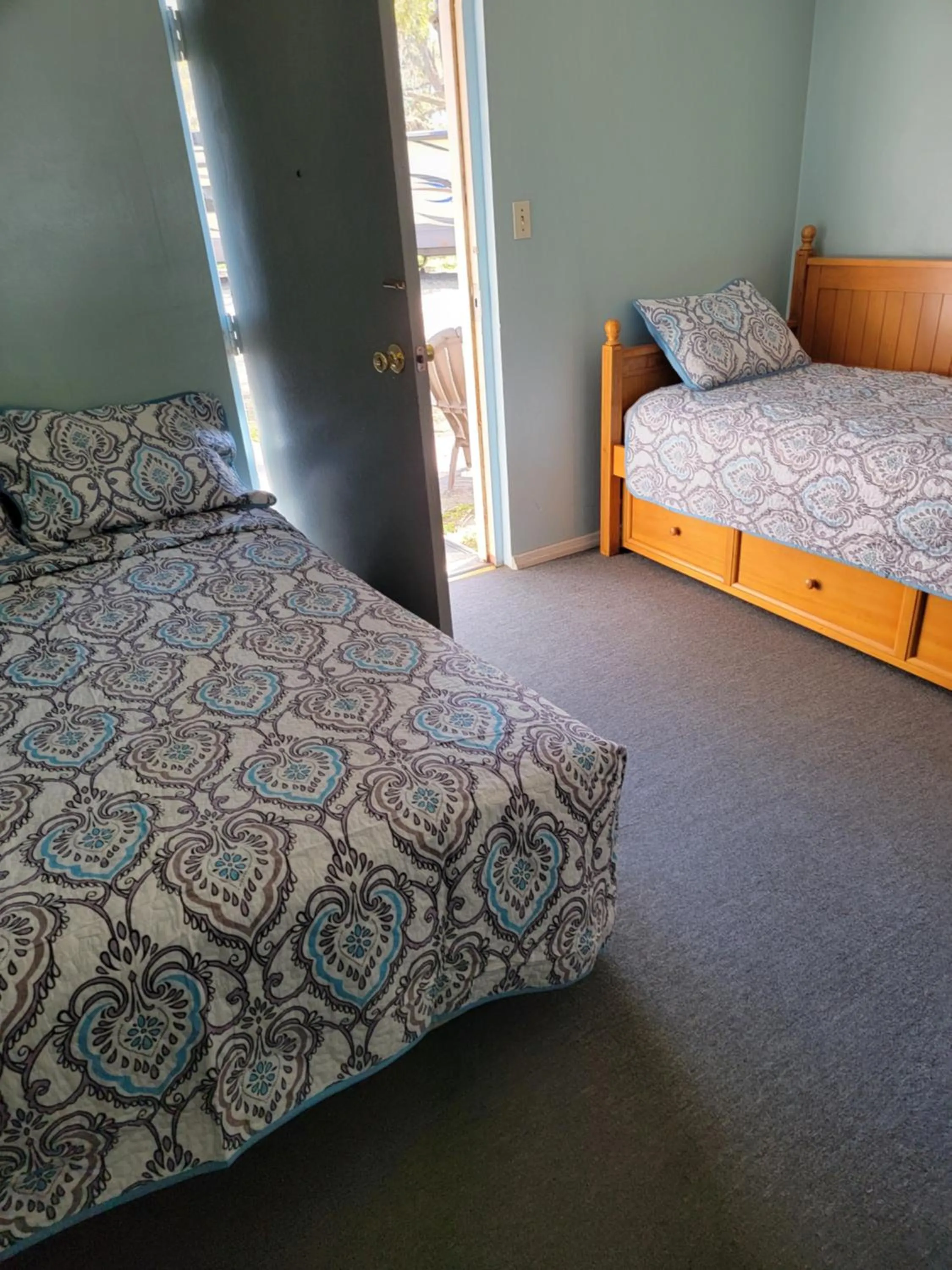 Bed in Cindy’s Motel & RV Park