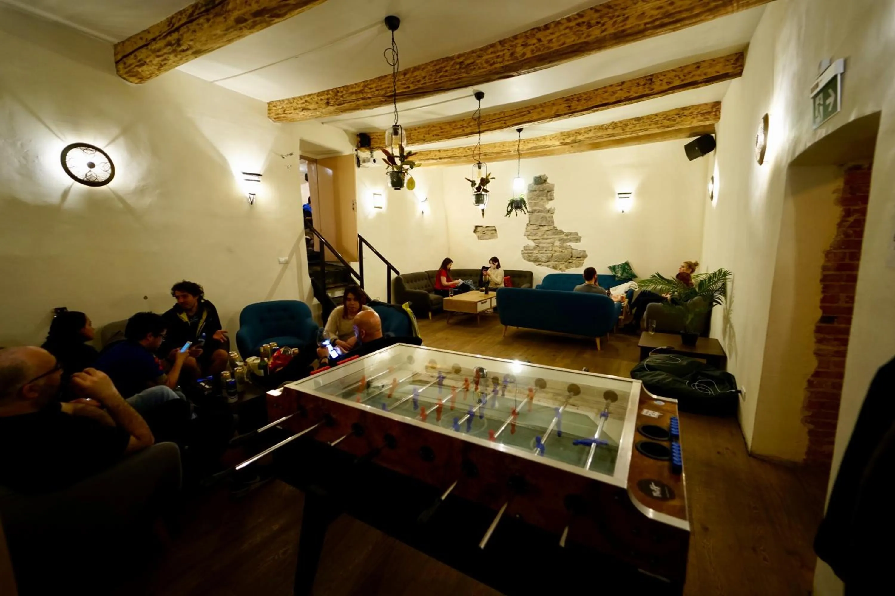 Communal lounge/ TV room in The Monks Bunk Hostel & Bar