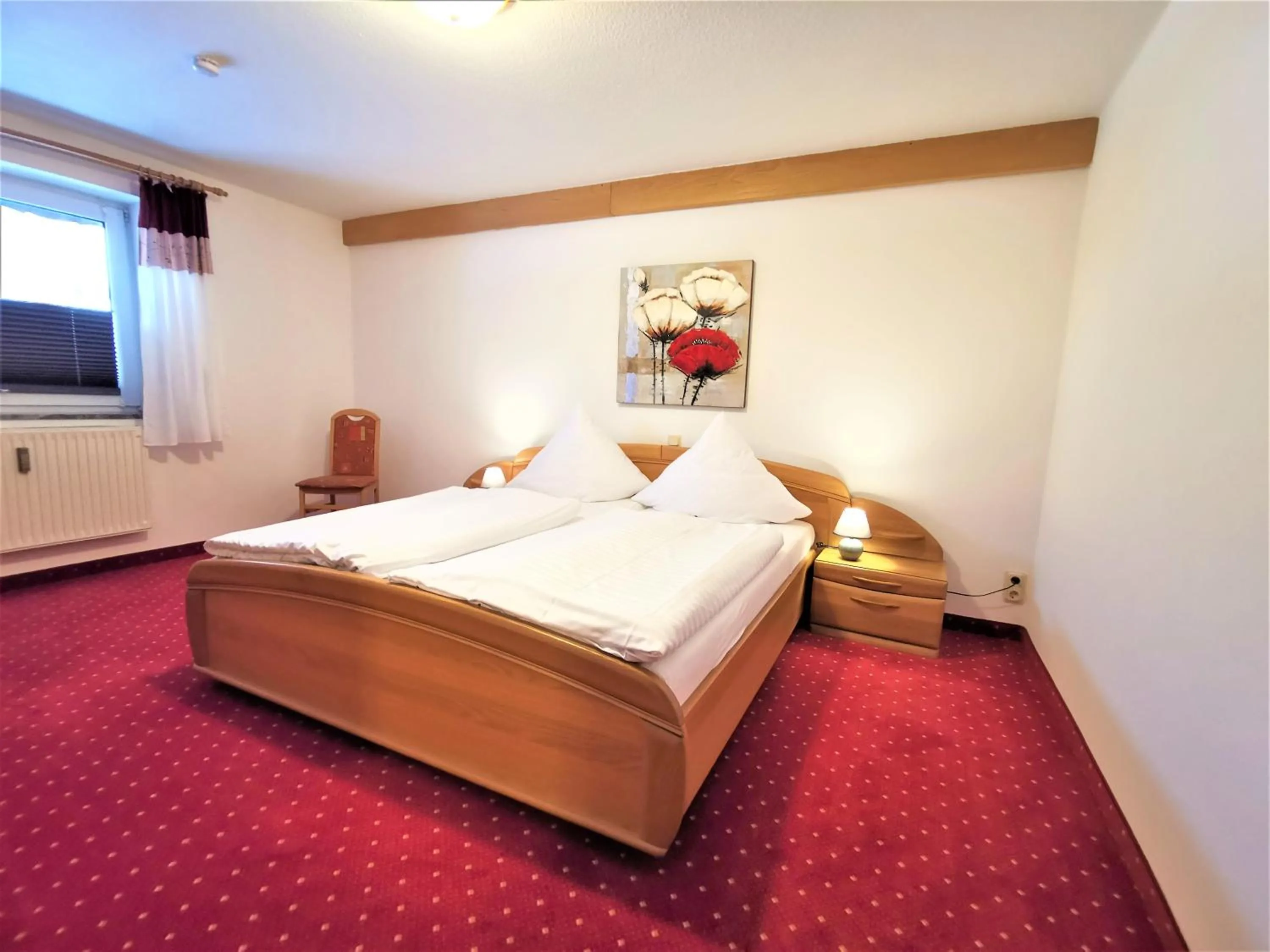 Bed in Hotel Ursula Garni