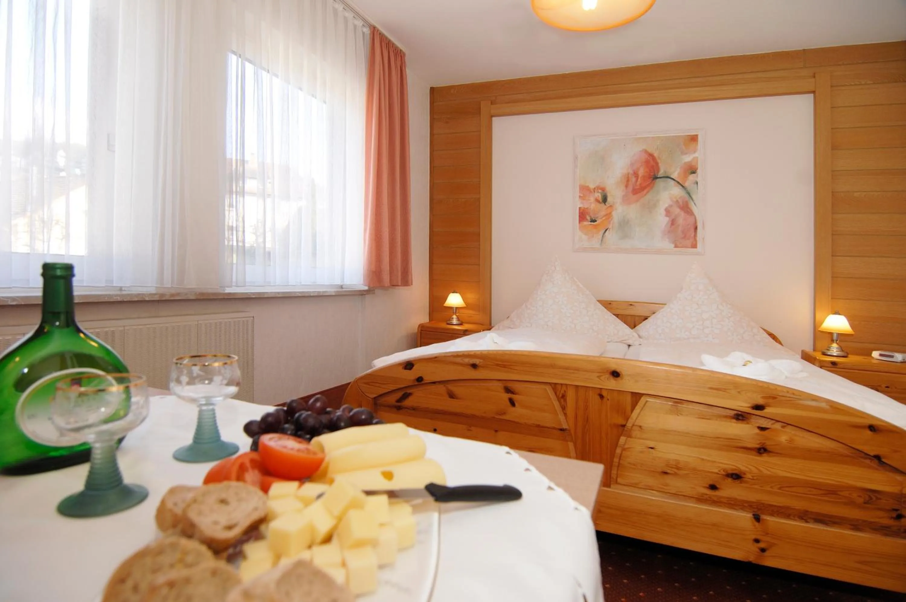 Seating area, Bed in Hotel Ursula Garni