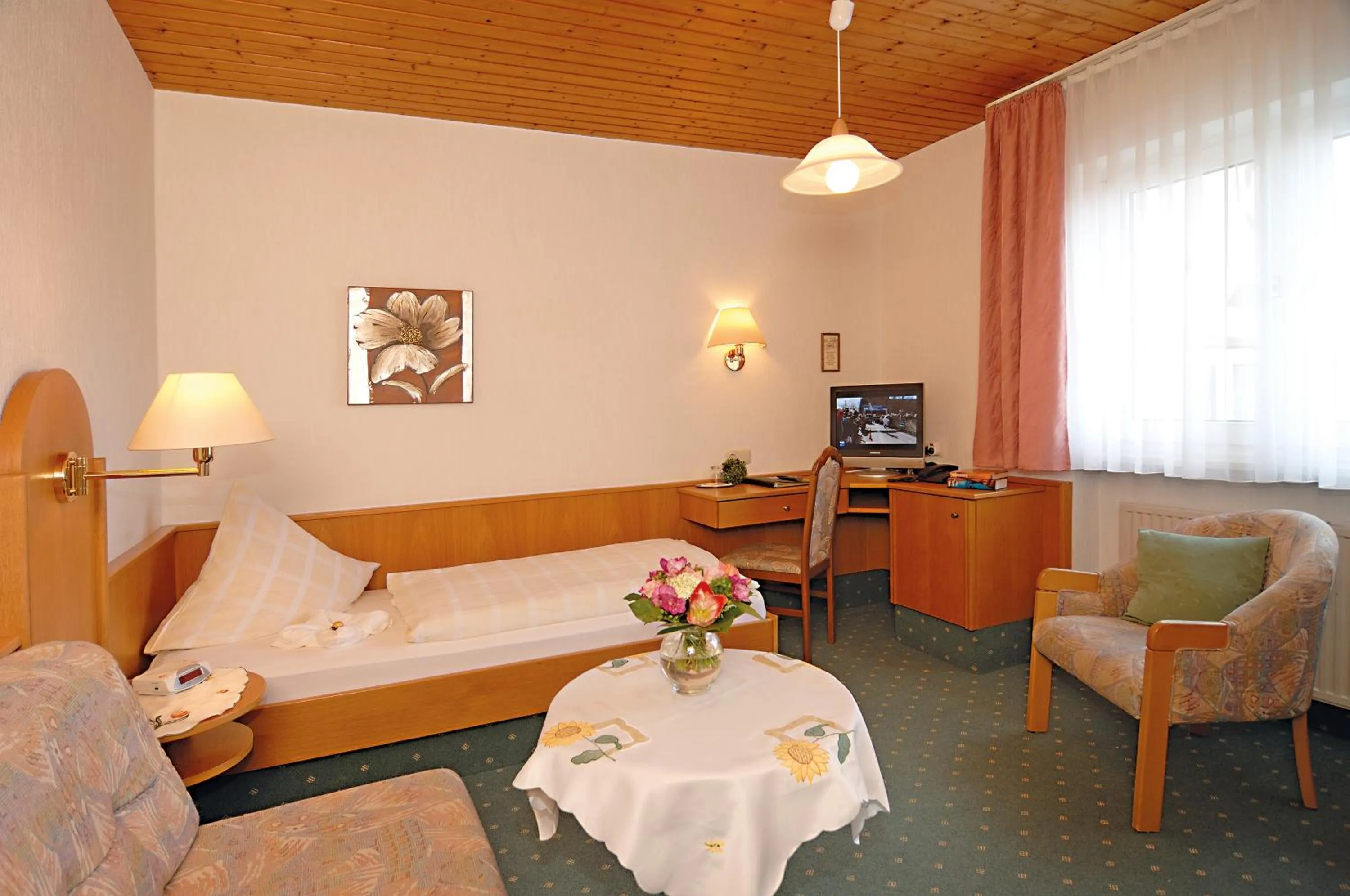 Bedroom in Hotel Ursula Garni
