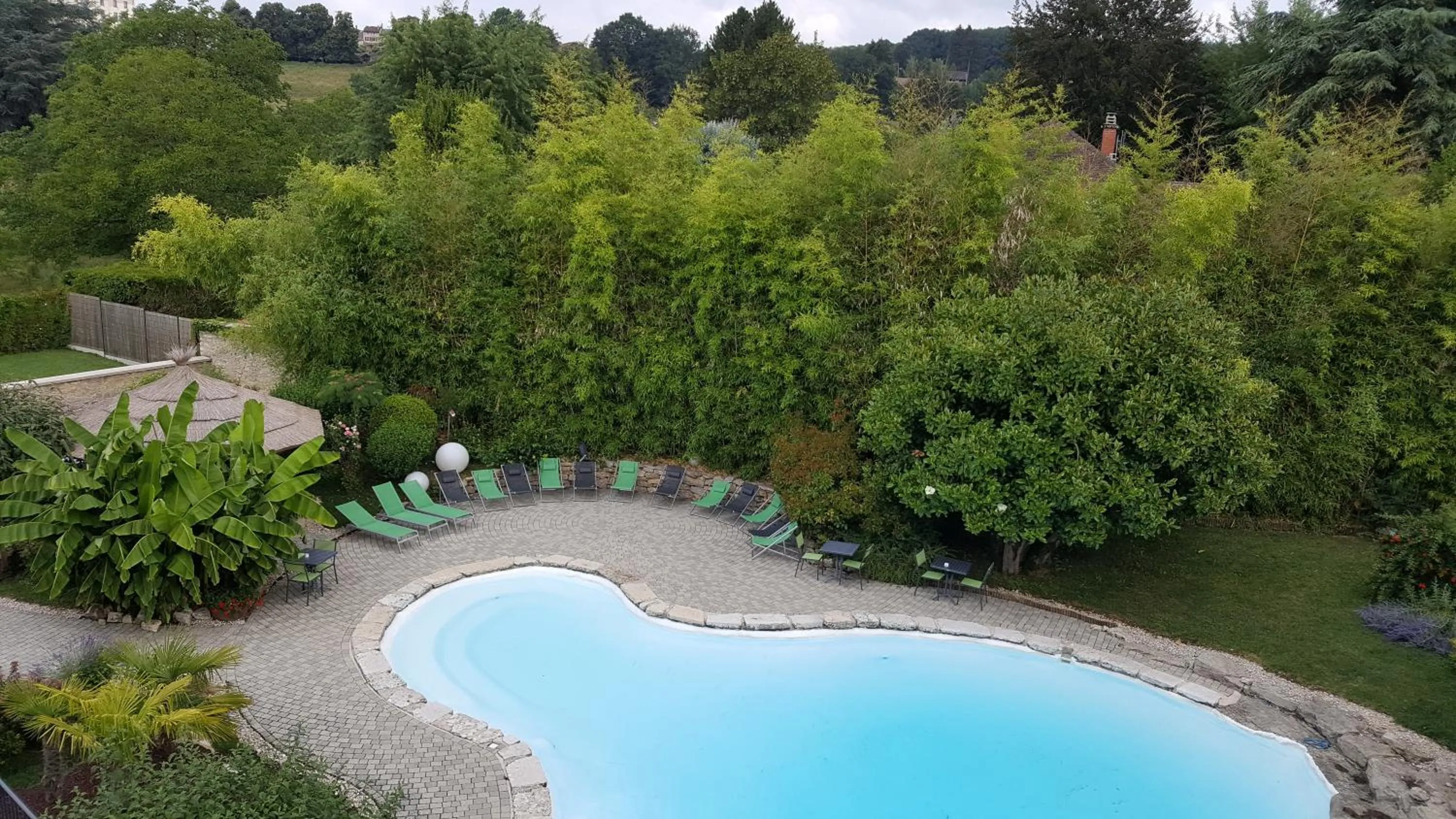 Swimming pool in Au Faisan Doré
