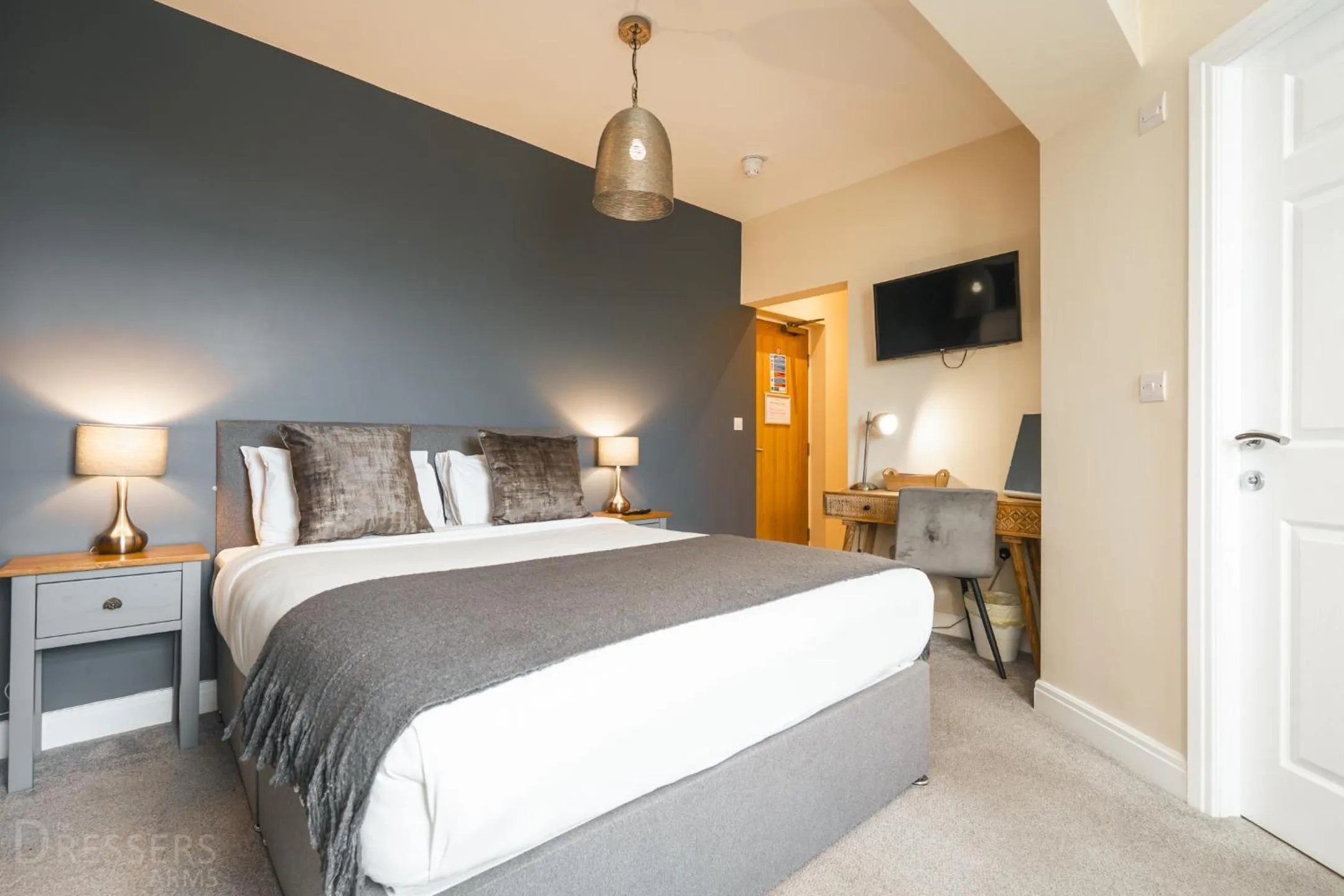 Bed in Rooms at The Dressers Arms