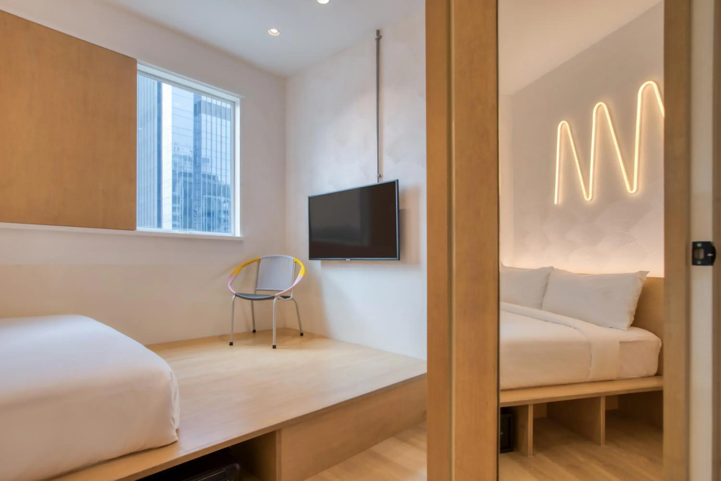 Bed in MoMo's Kuala Lumpur Bed in MoMo's Kuala Lumpur