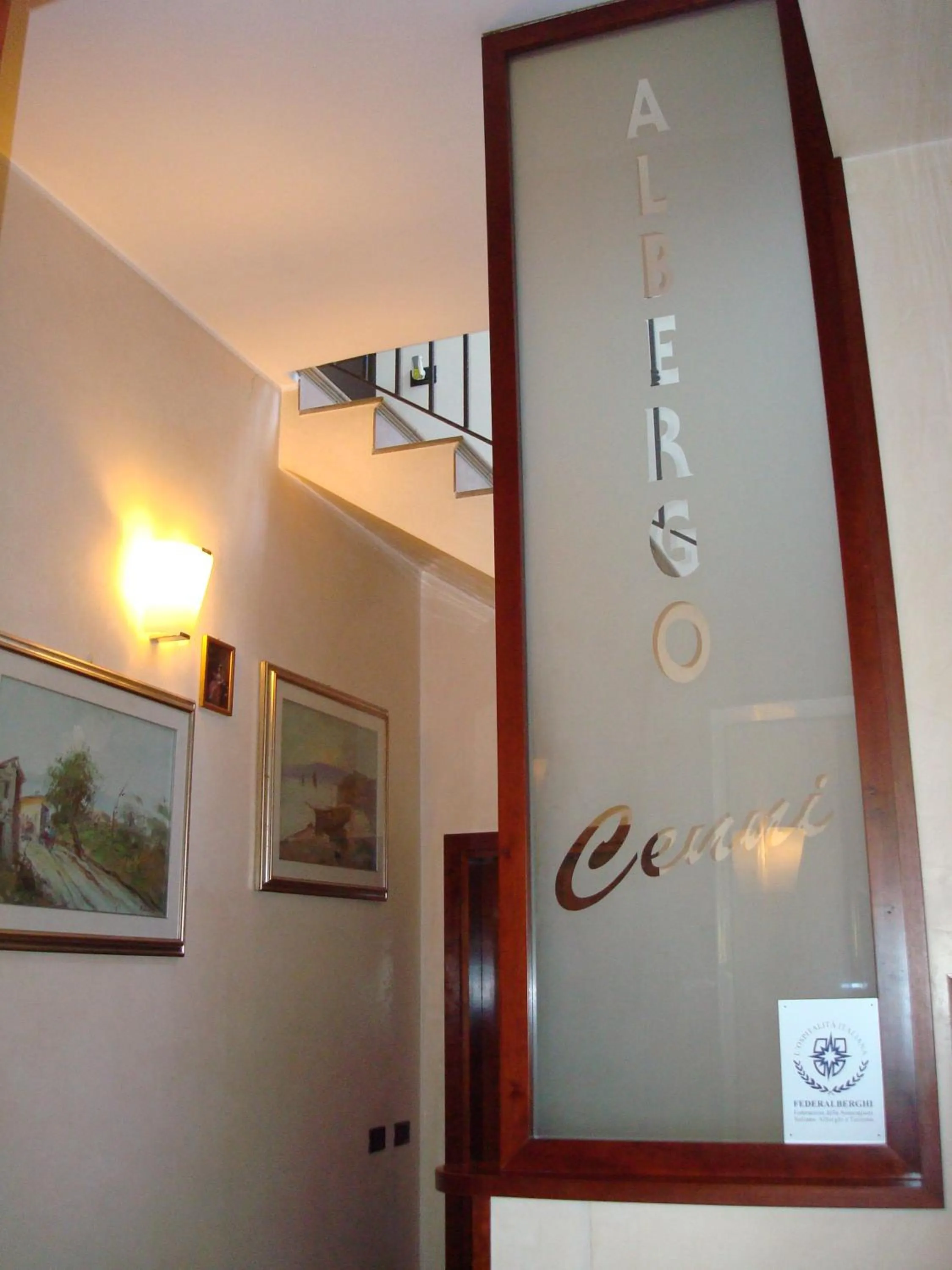 Property logo or sign in Albergo Cenni