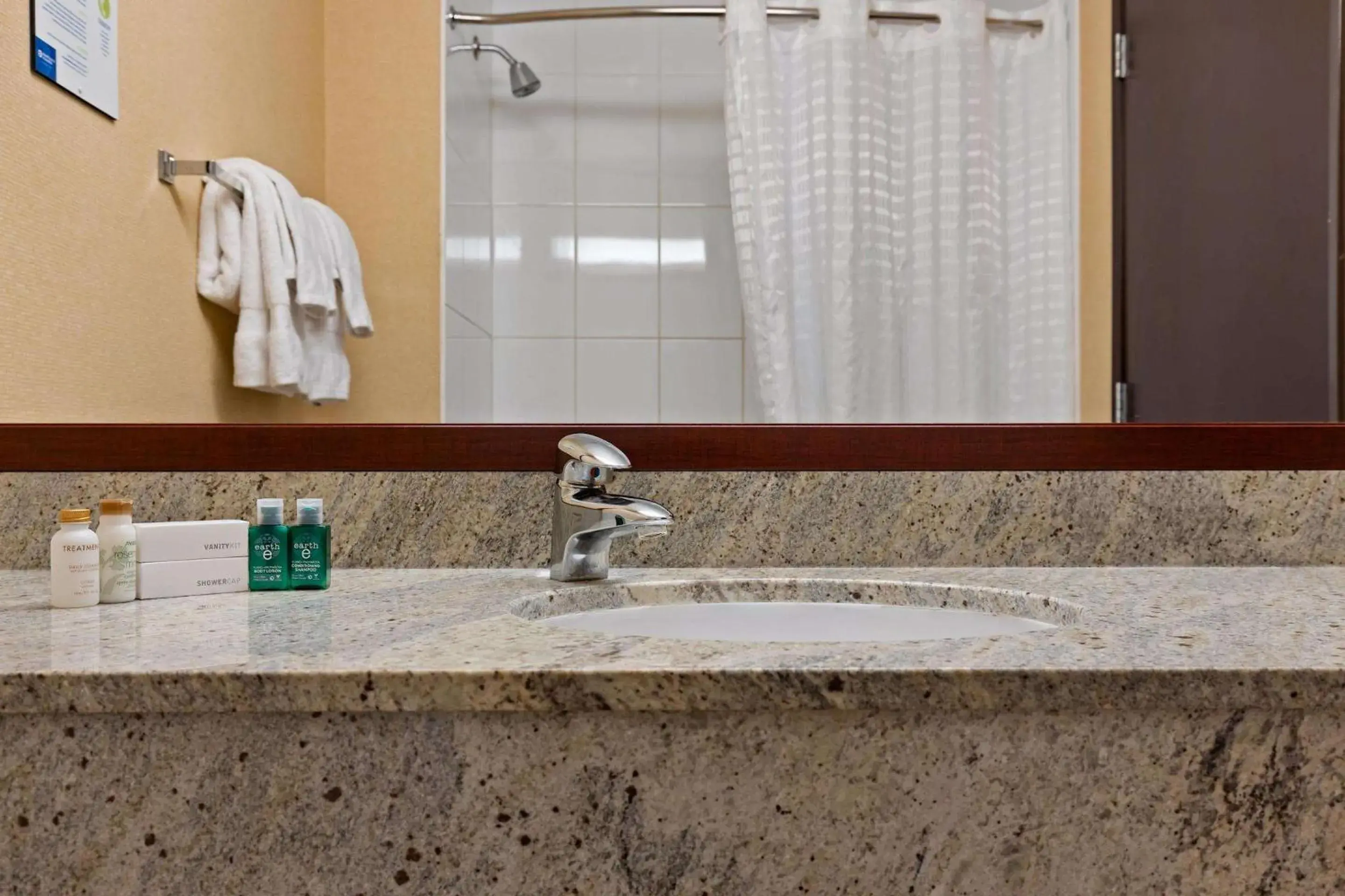 Bathroom in Coast Fraser Inn Bathroom in Coast Fraser Inn