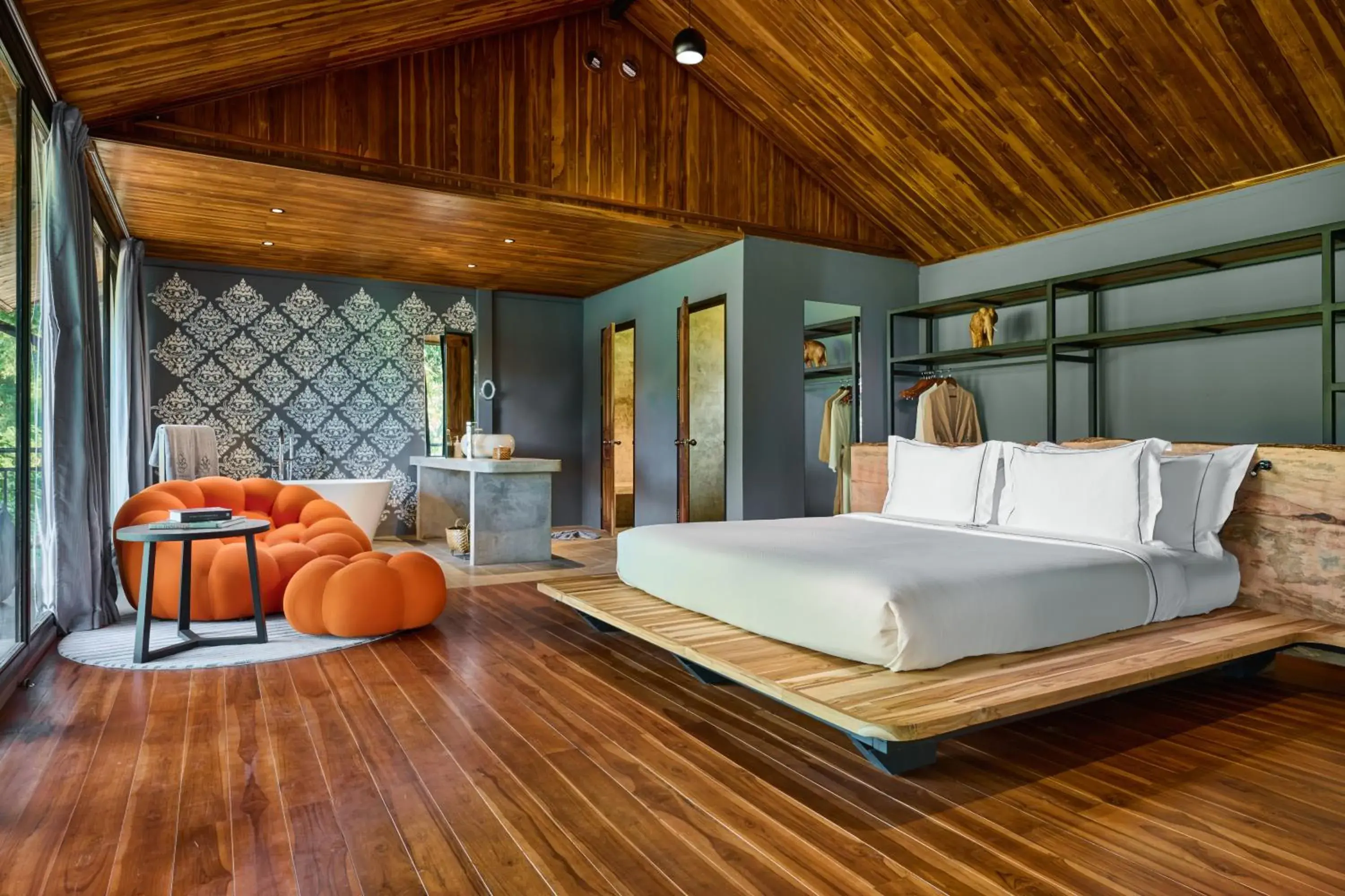 Bed in The Namkhan, a Small Luxury Hotel of the World Bed in The Namkhan, a Small Luxury Hotel of the World