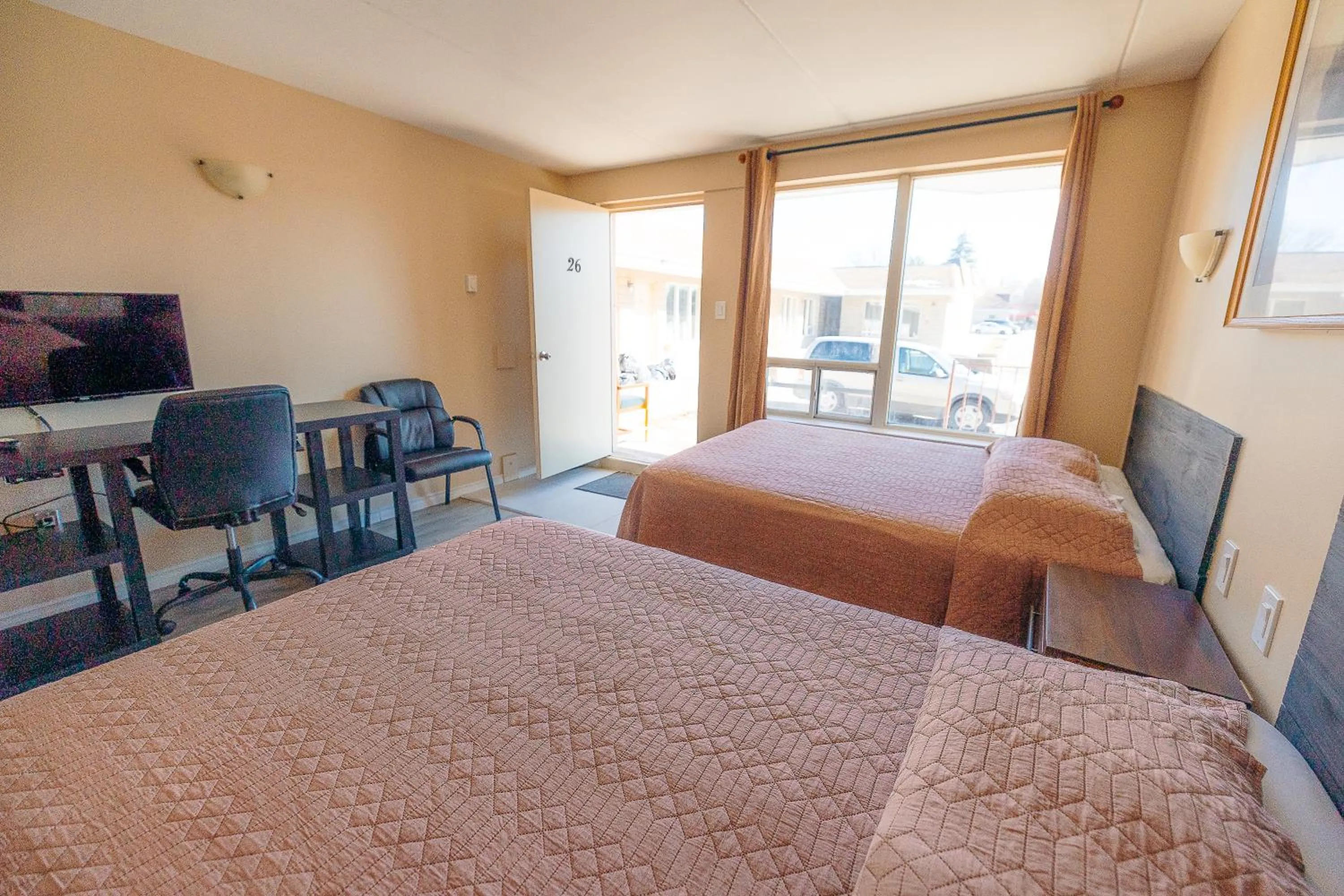 Bed in Clarkson Village Motel, 1815 Lakeshore Rd West Mississauga