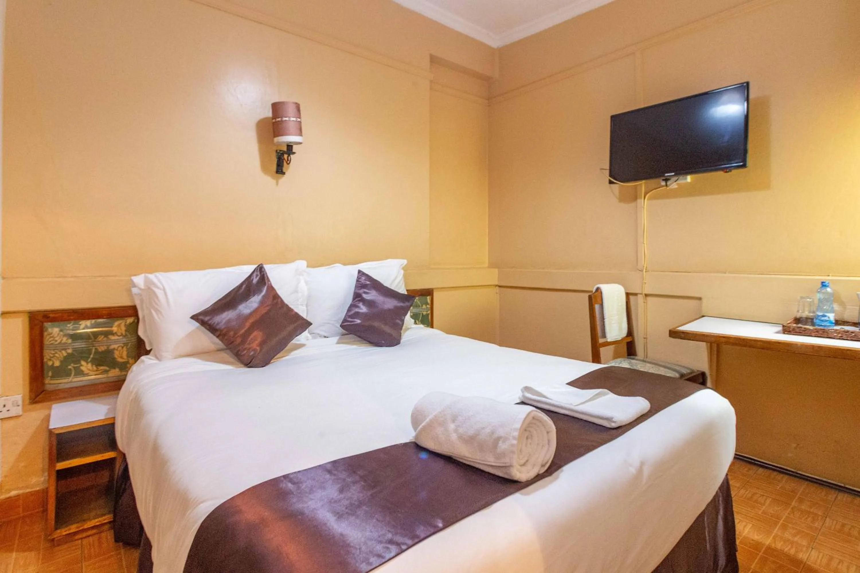 Bed in Impala Hotel Parklands