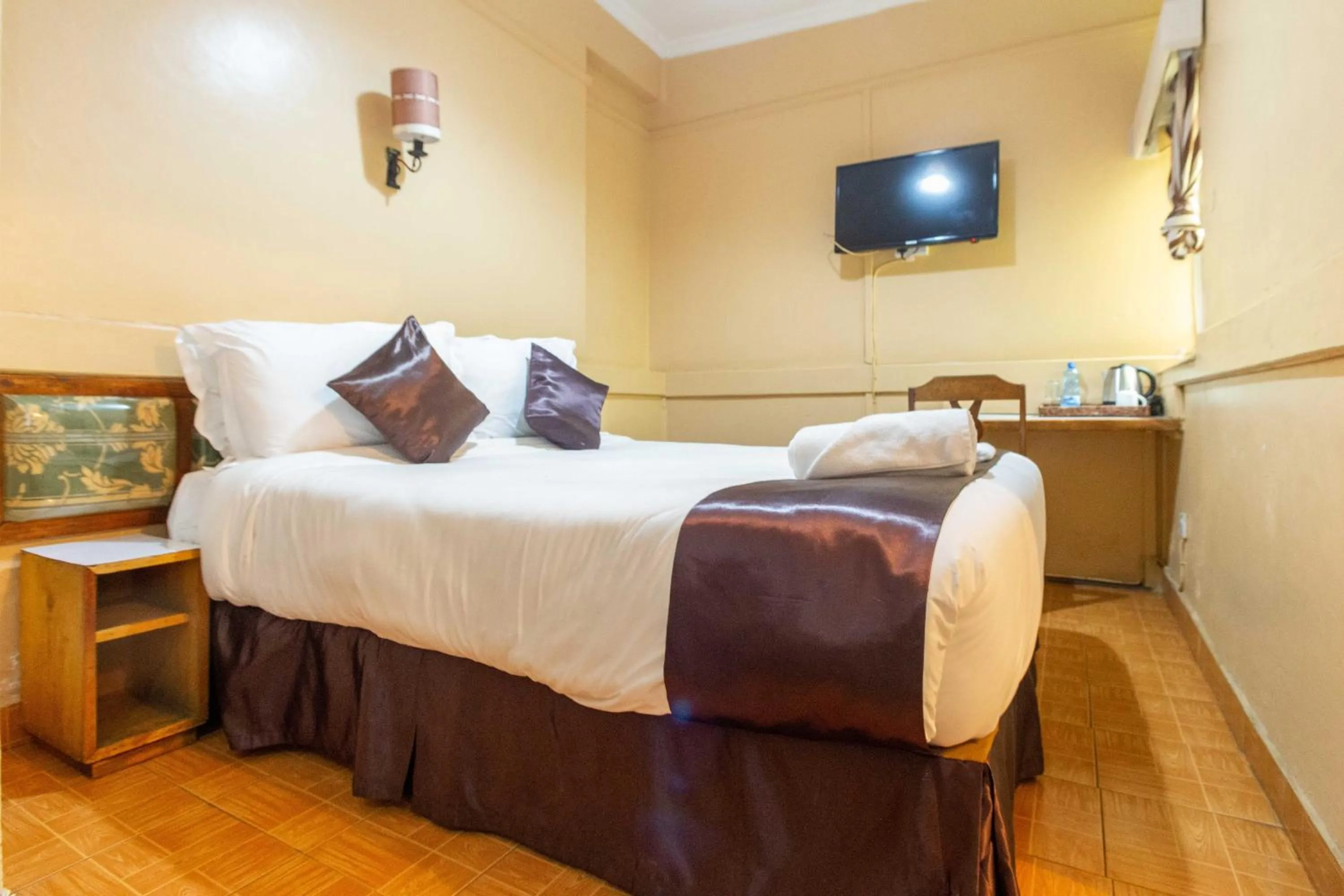 Bed in Impala Hotel Parklands