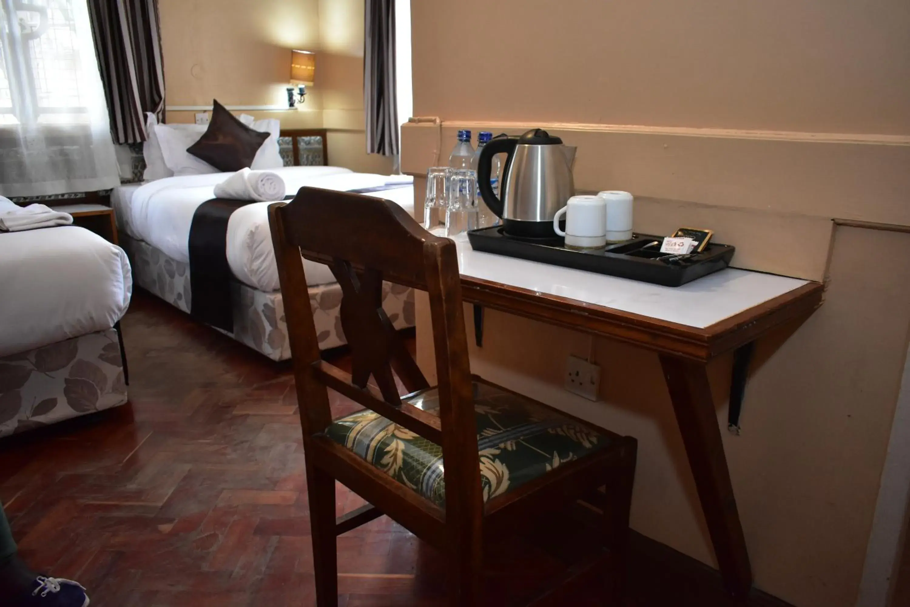 Coffee/tea facilities, Bed in Impala Hotel Parklands Coffee/tea facilities, Bed in Impala Hotel Parklands