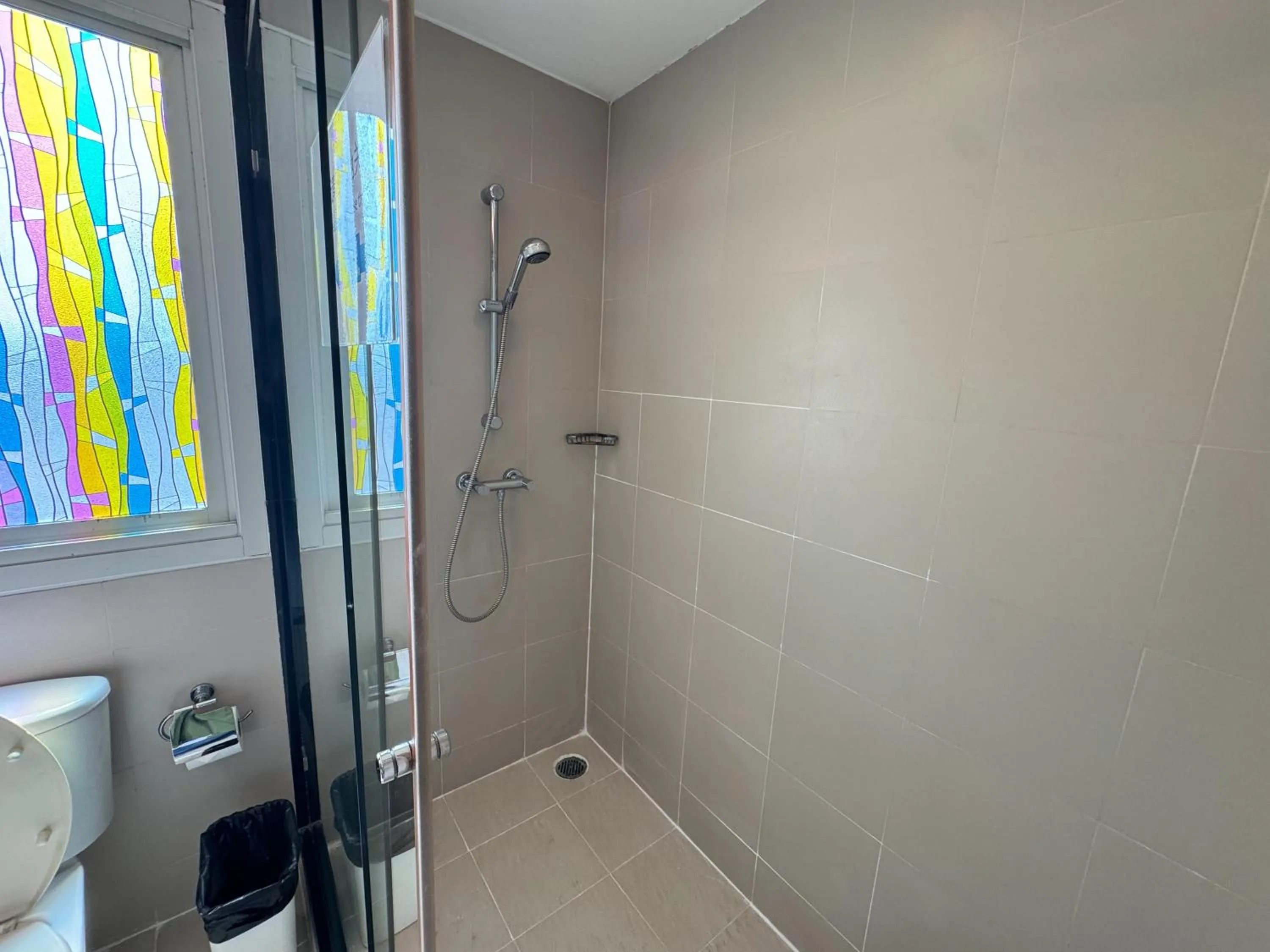 Shower in The Narathiwas Hotel & Residence Sathorn Bangkok