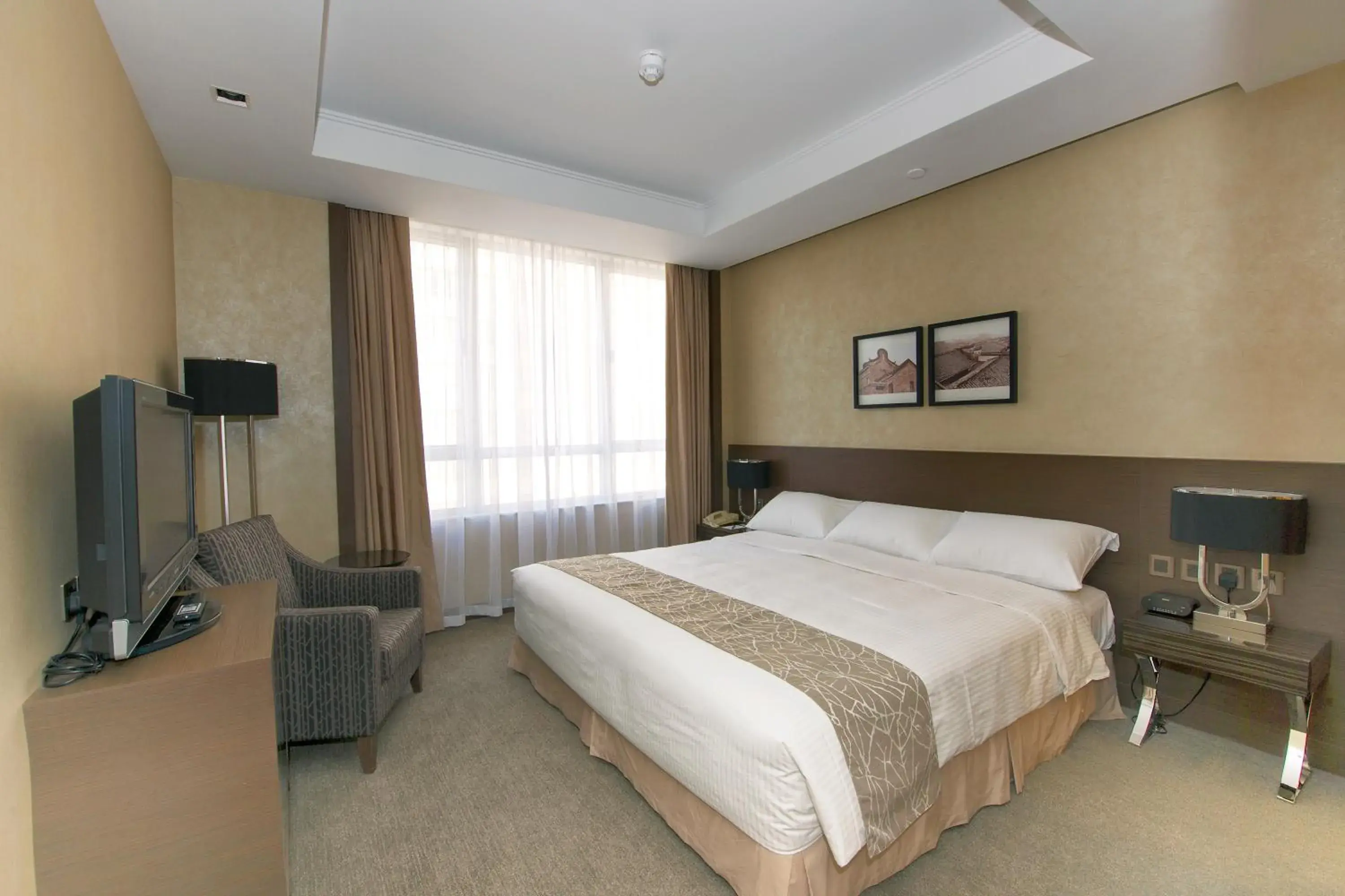 Photo of the whole room, Bed in The Salisbury - YMCA of Hong Kong Photo of the whole room, Bed in The Salisbury - YMCA of Hong Kong