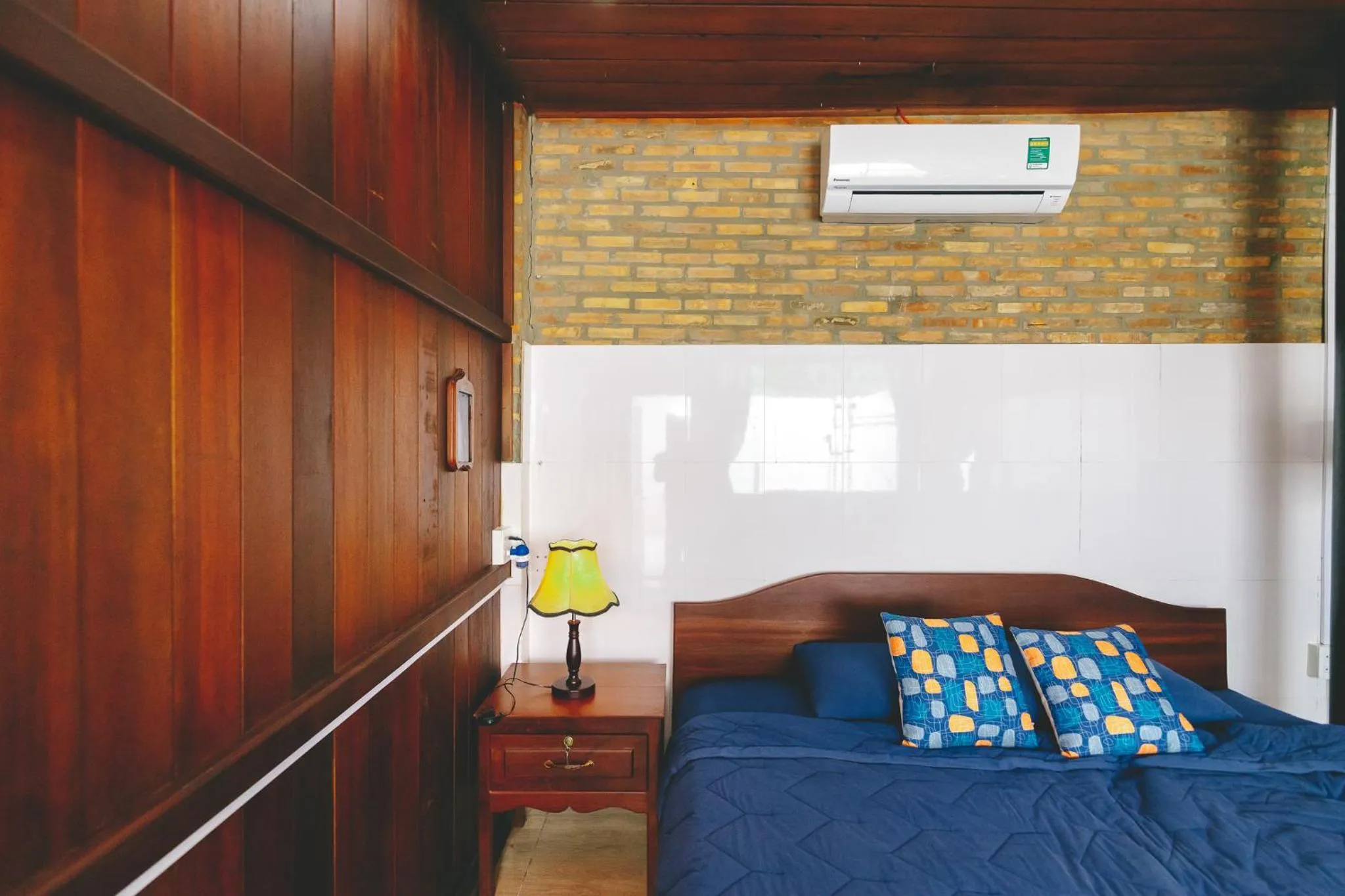 Bed in CASA ECO Mekong Resort