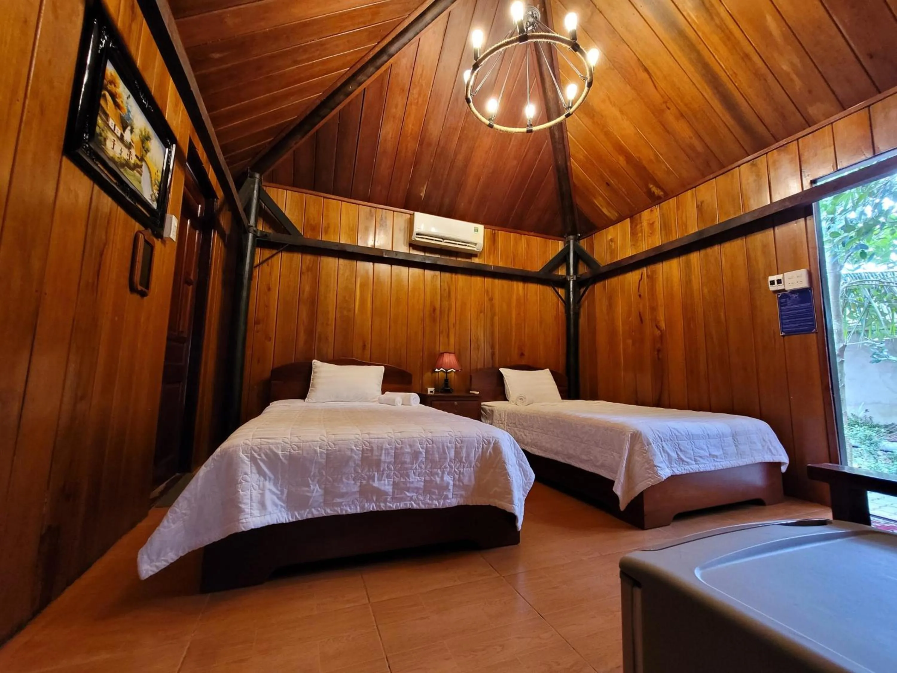 Bed in CASA ECO Mekong Resort