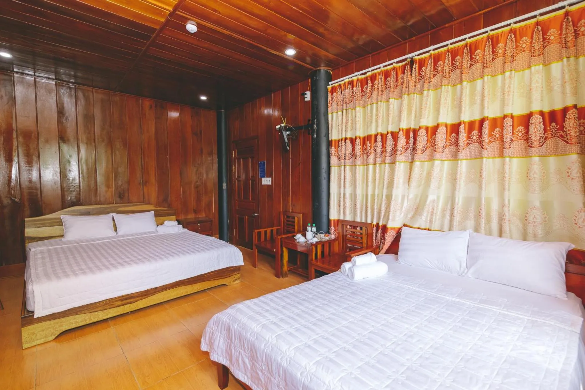 Bed in CASA ECO Mekong Resort