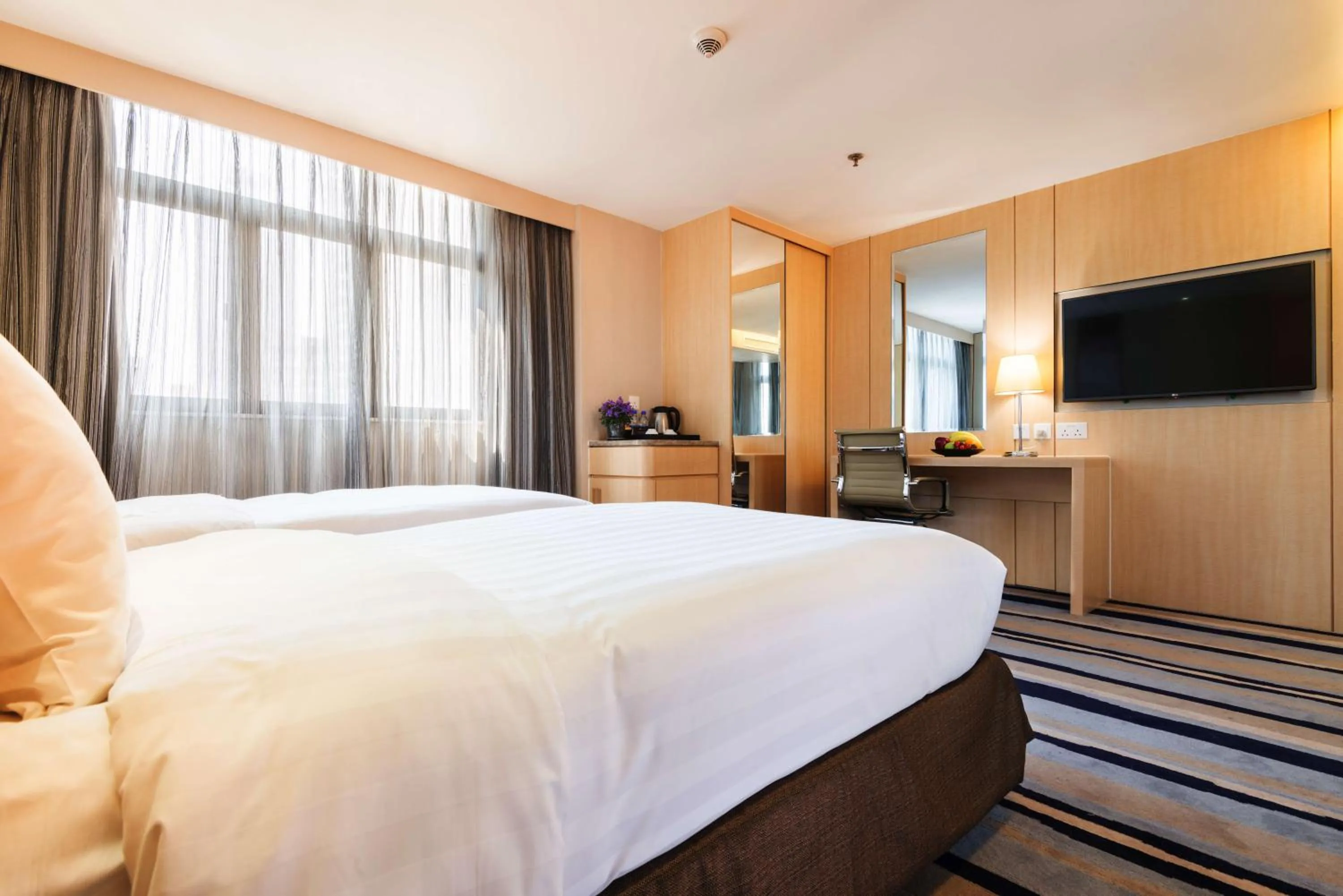 Decorative detail, Bed in Metropark Hotel Mongkok