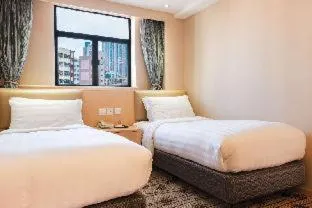 Bed in Metropark Hotel Mongkok