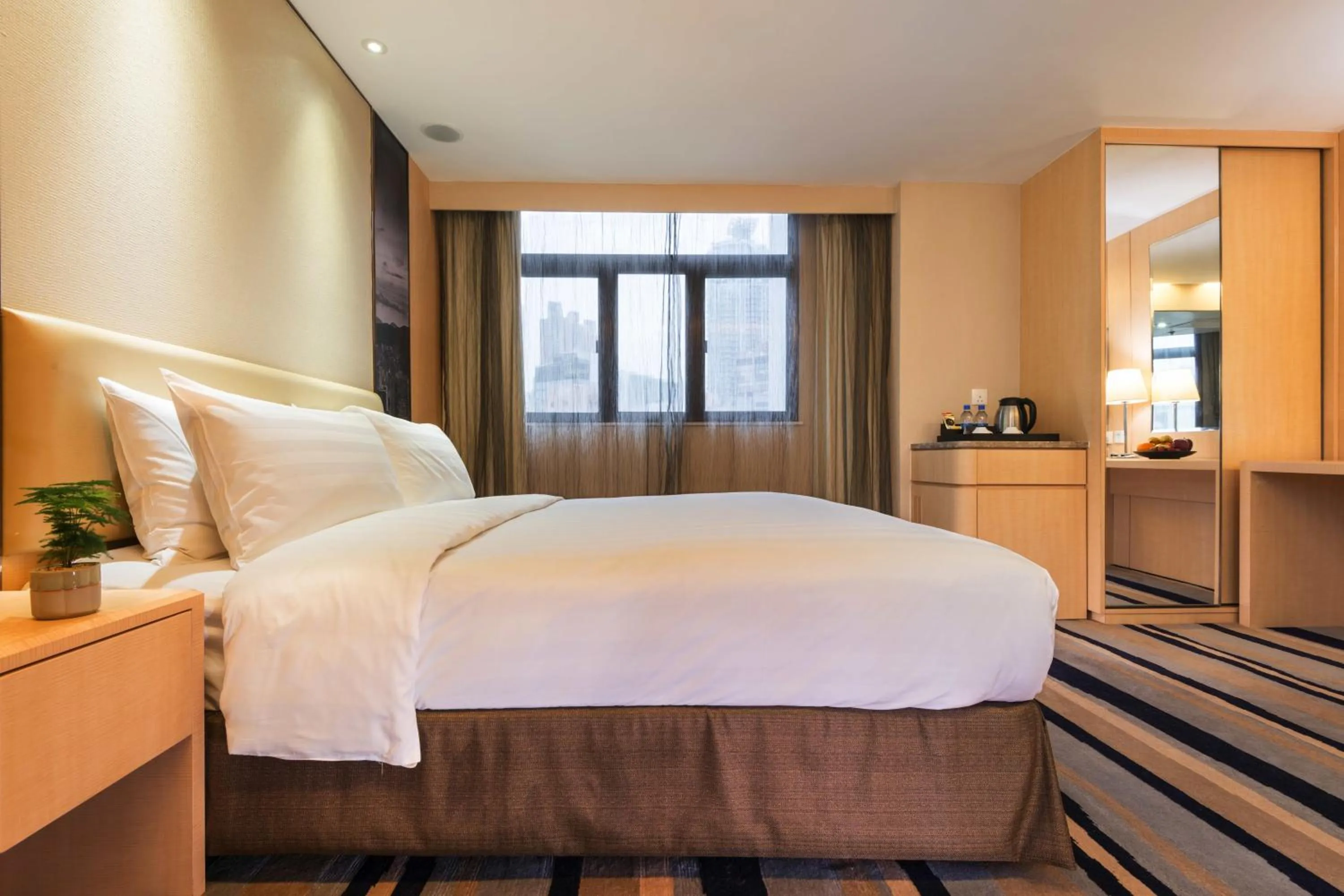 Decorative detail, Bed in Metropark Hotel Mongkok