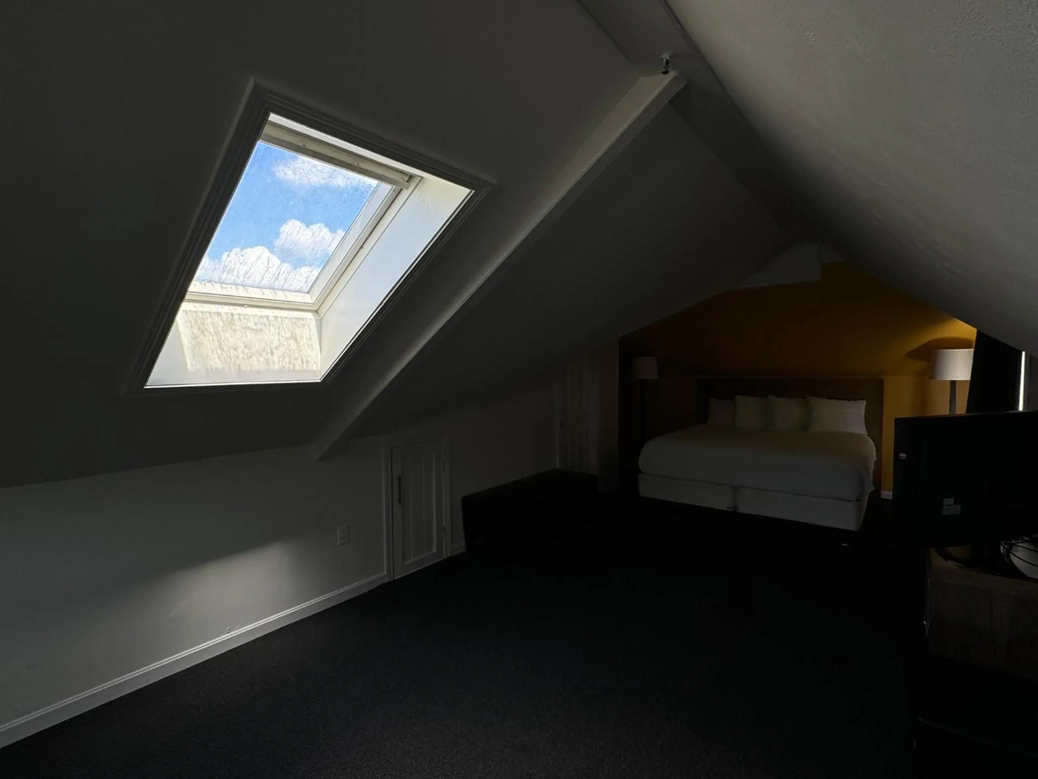 Bed in Winnisquam Lake Inn